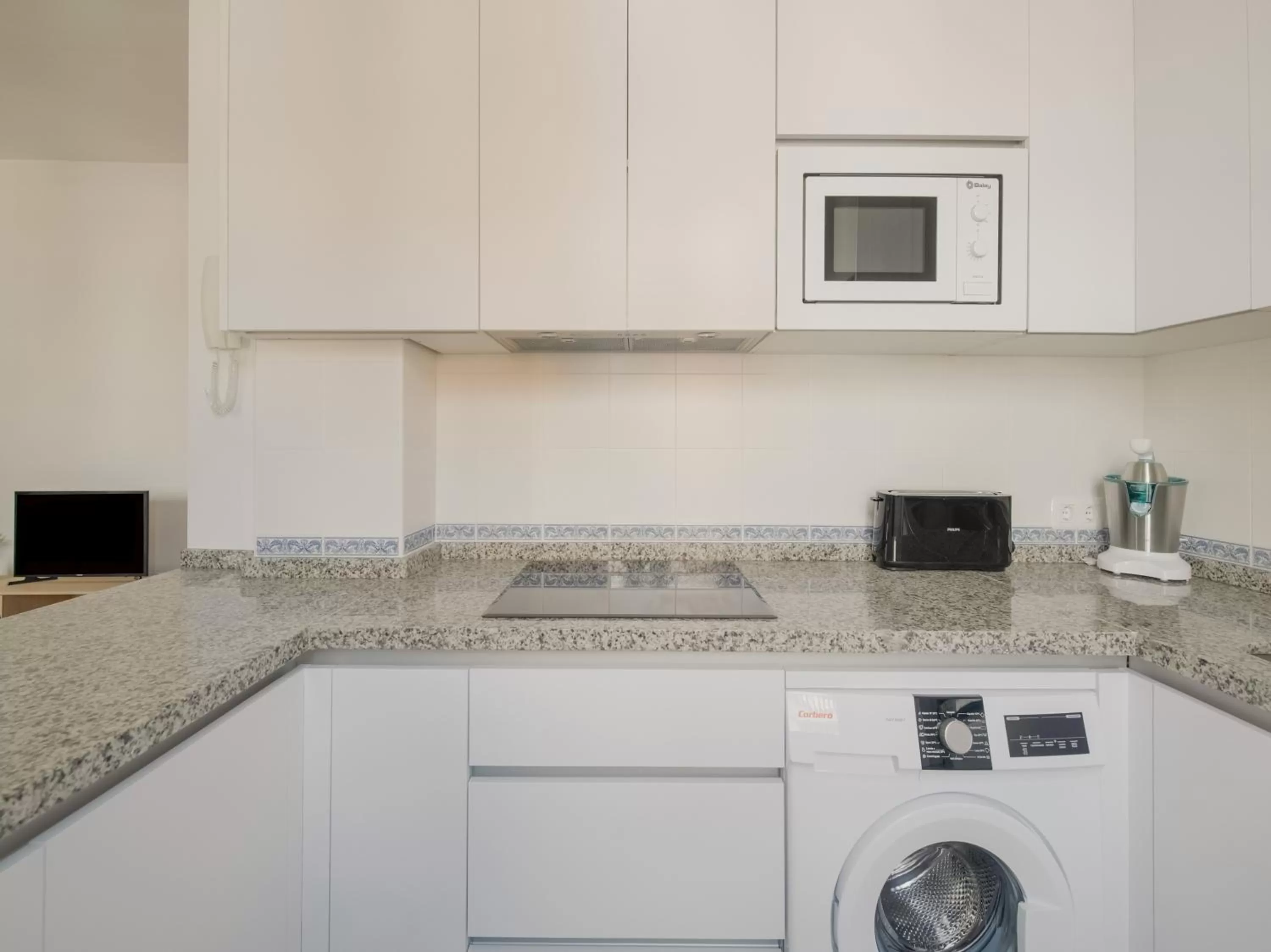 Kitchen or kitchenette in Apartamentos Santiago