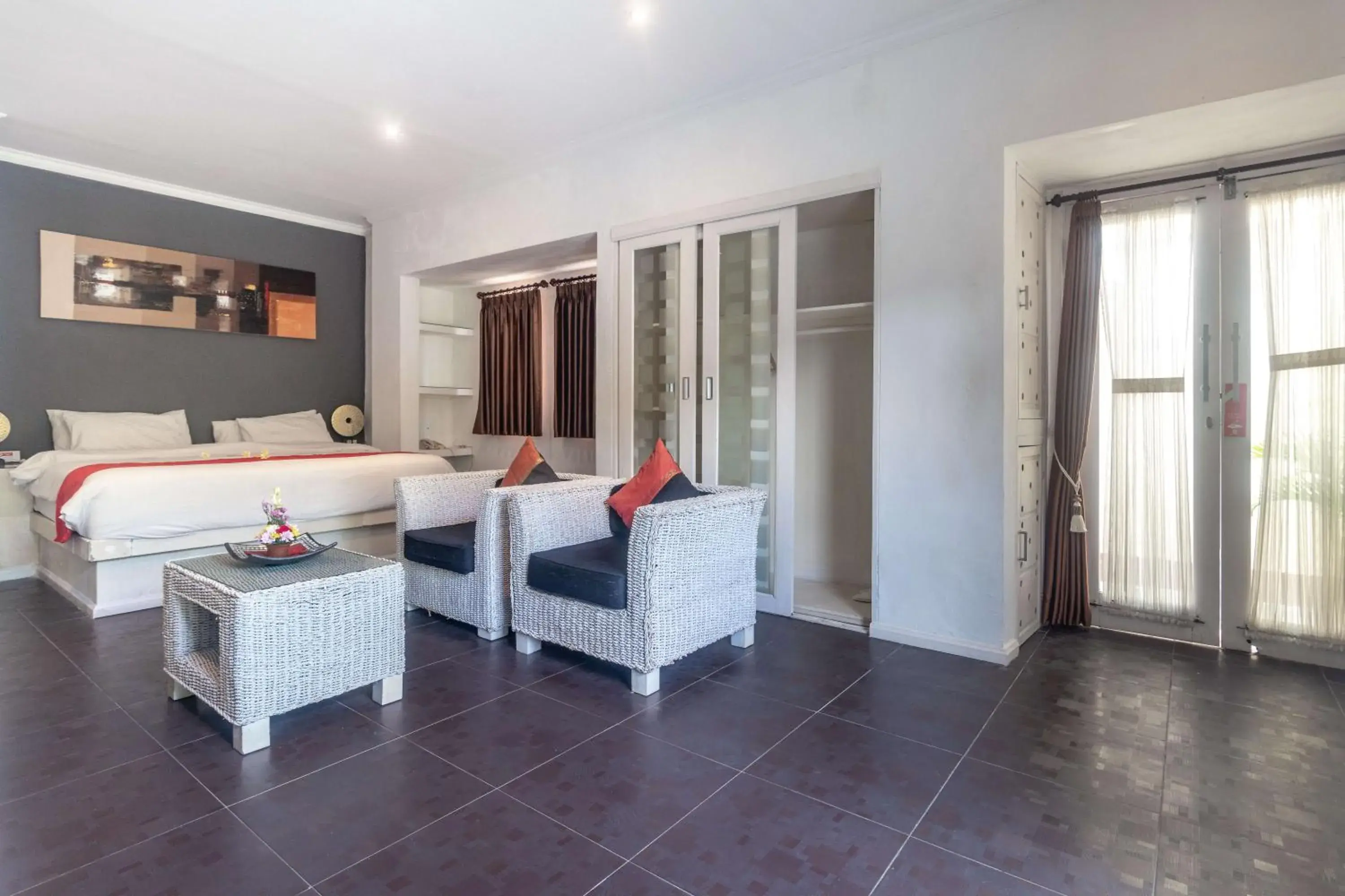 Bedroom, Seating Area in Aleesha Villas and Suites