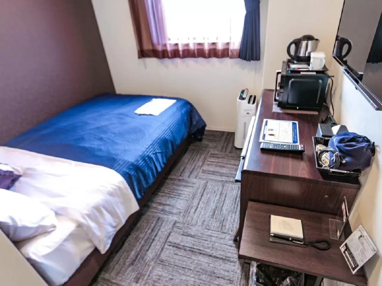 Bed in HOTEL LiVEMAX Chiba-Ekimae