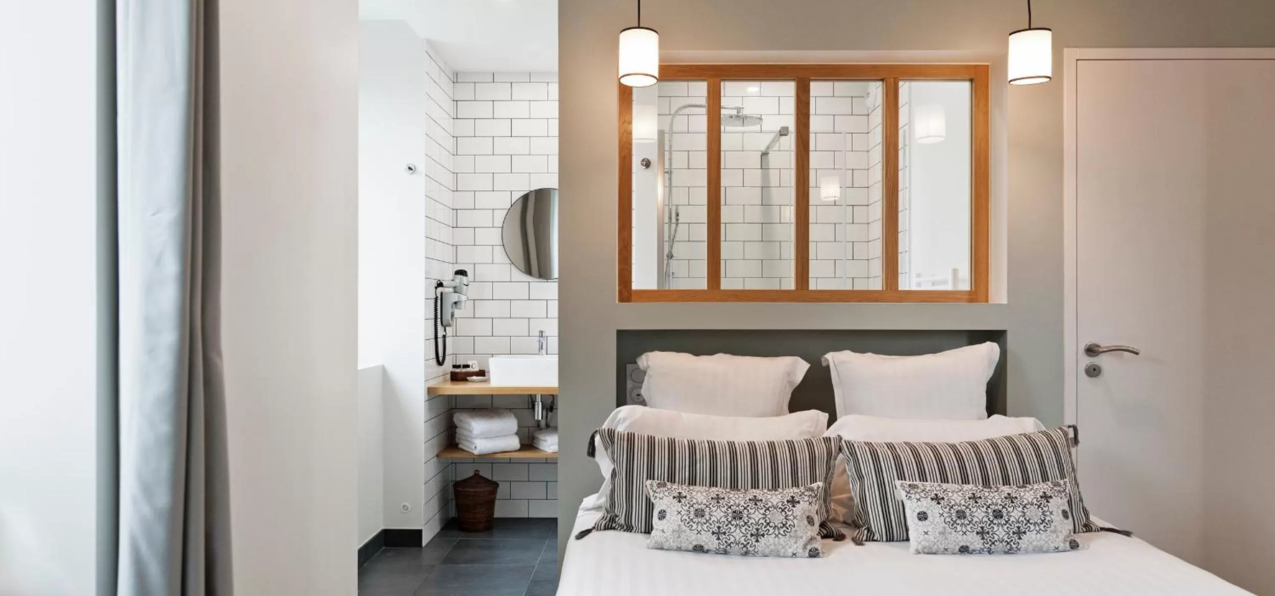 Bed in Hôtel Les Costans, The Originals Relais