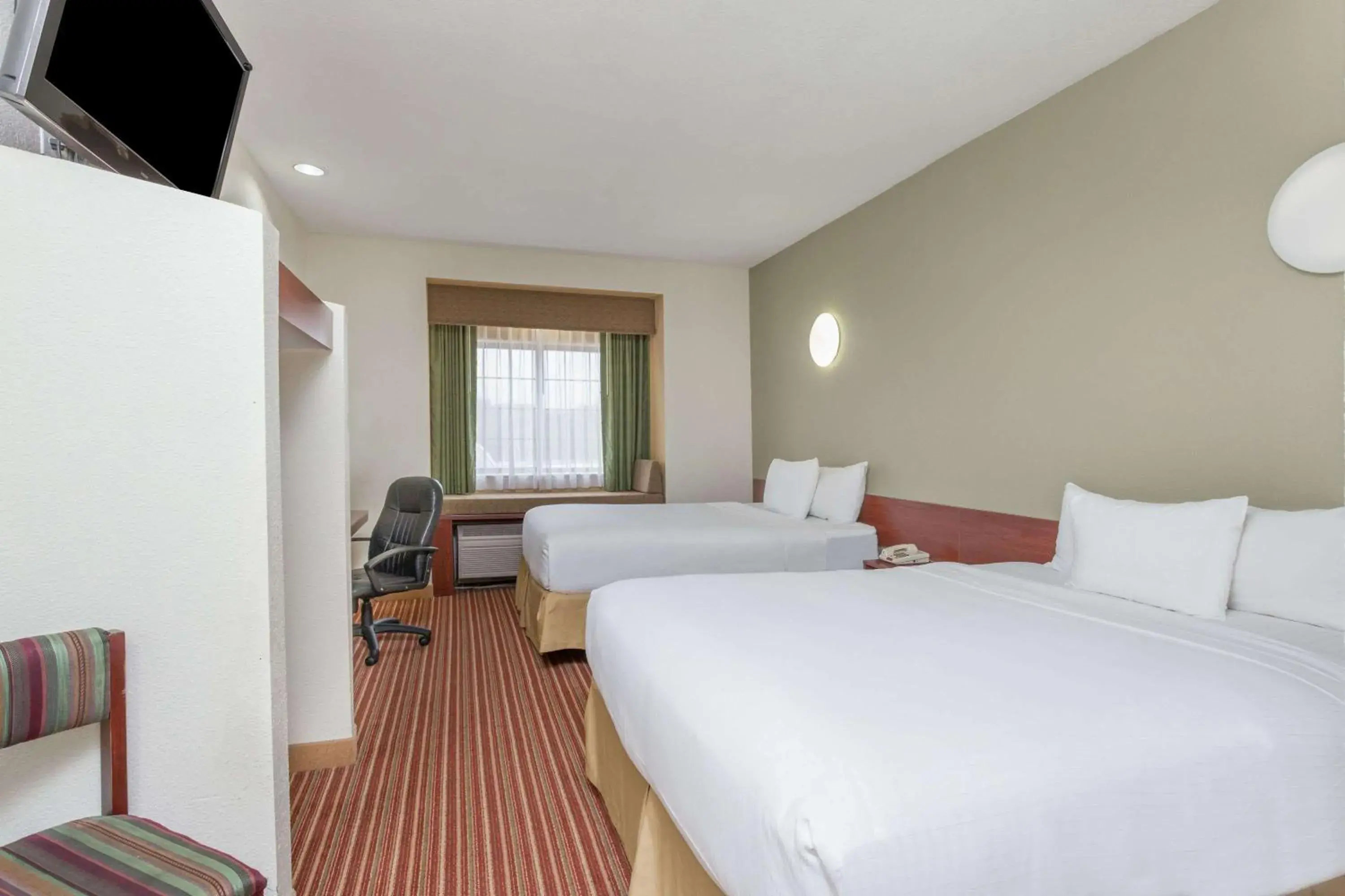 Photo of the whole room in Days Inn by Wyndham near Kansas Speedway