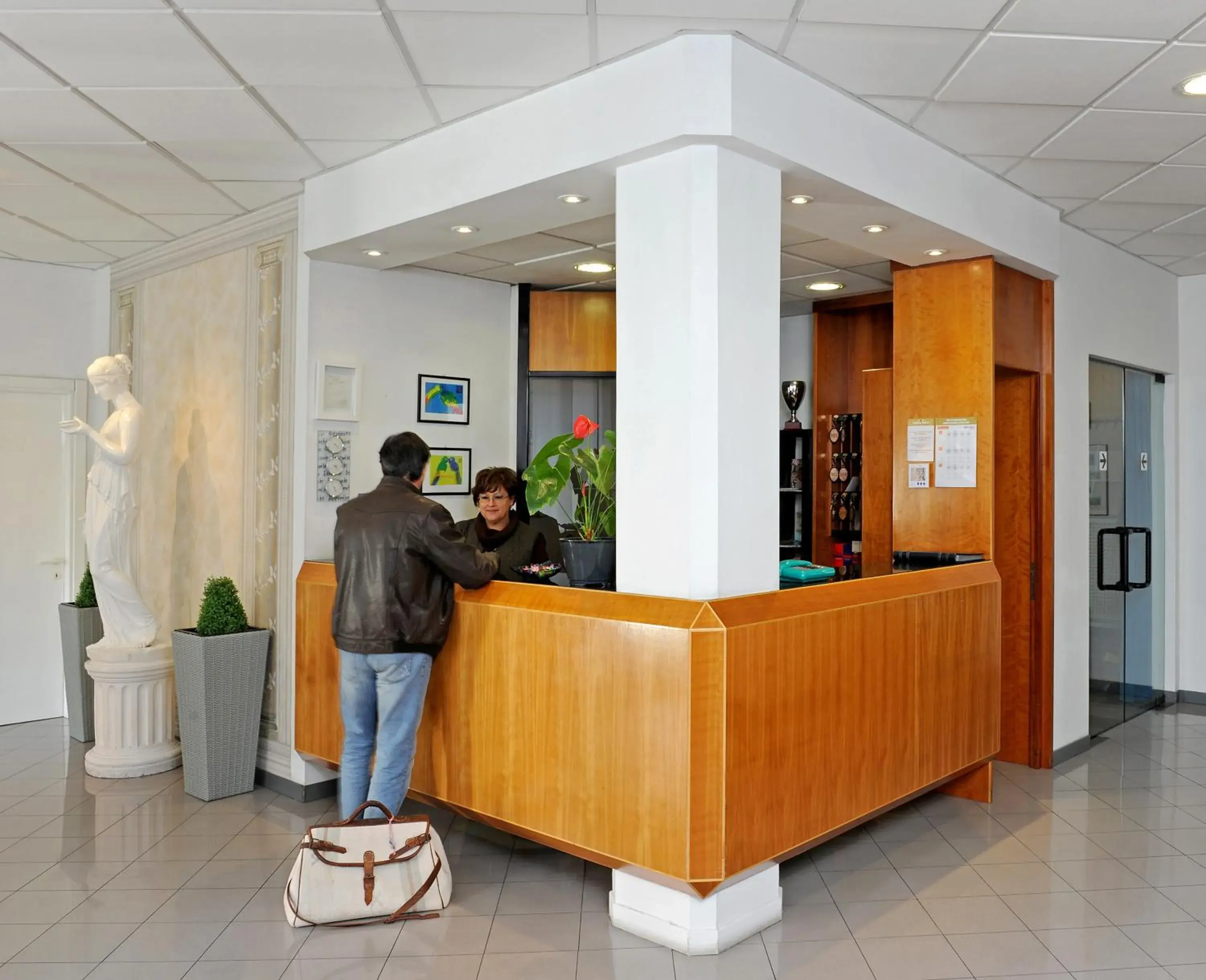 Lobby or reception in Tuscia Hotel