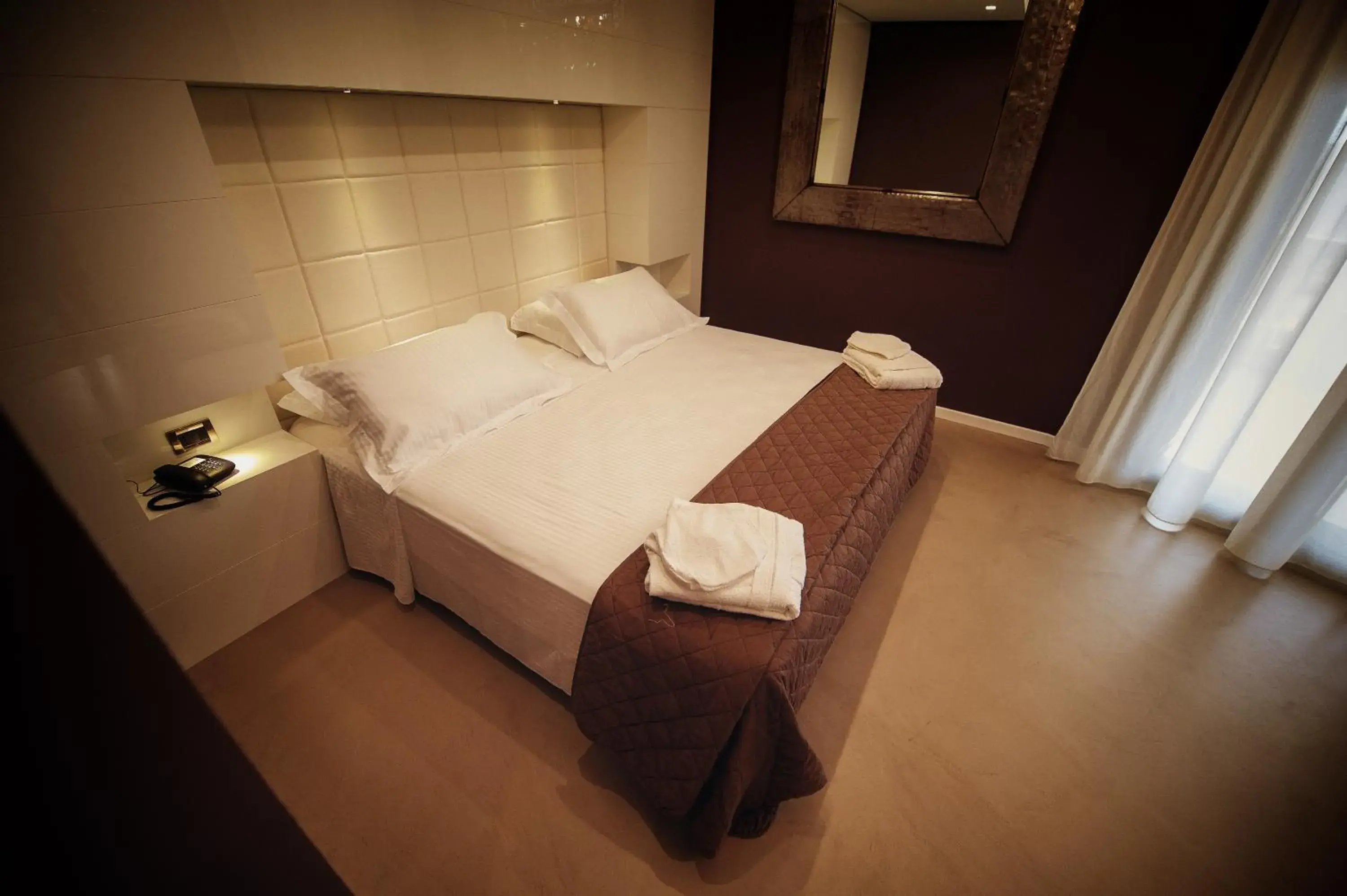 Bed in Gran Paradiso Hotel Spa