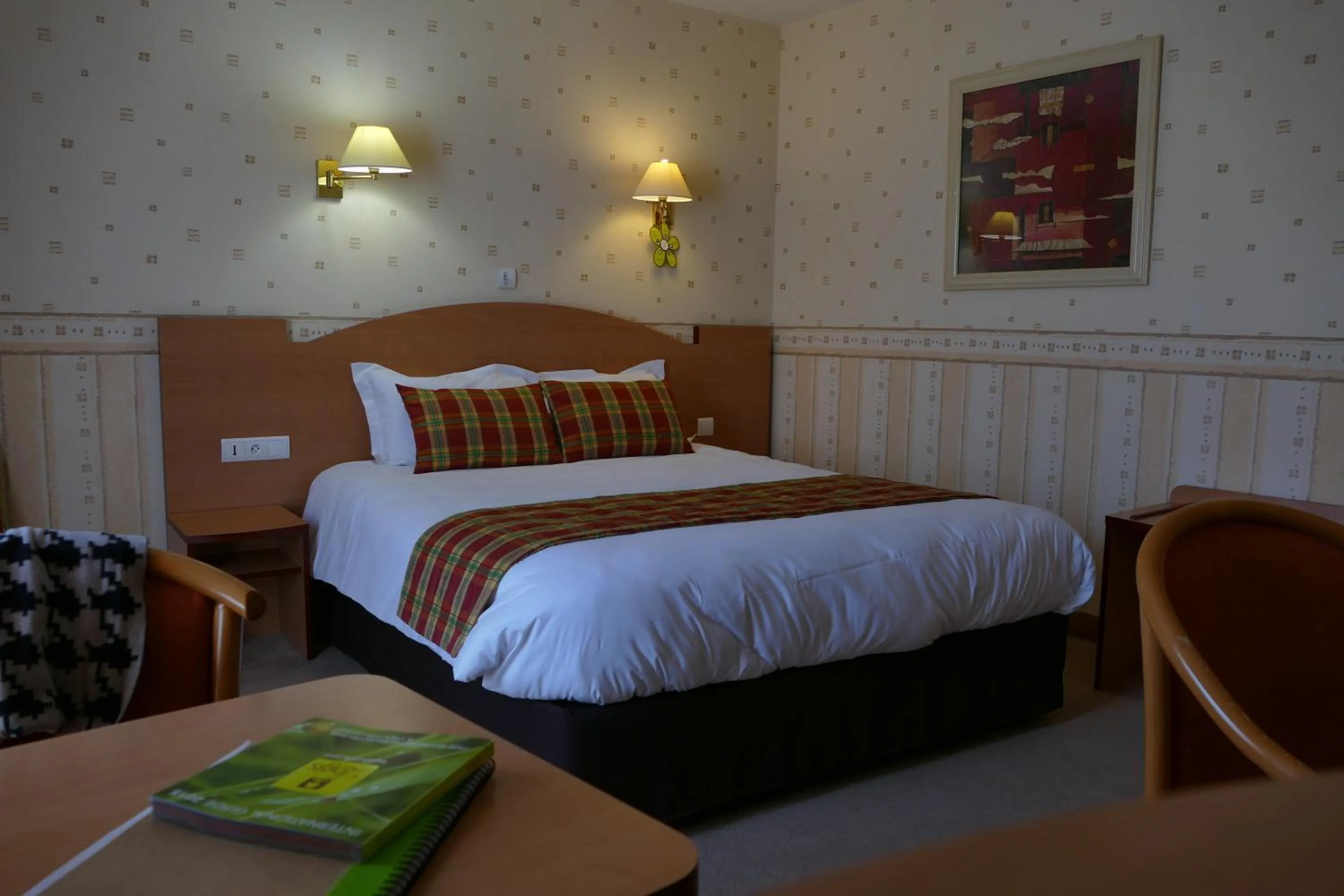 Bed in Logis Hotels Le Champalud Restaurant La Citadelle
