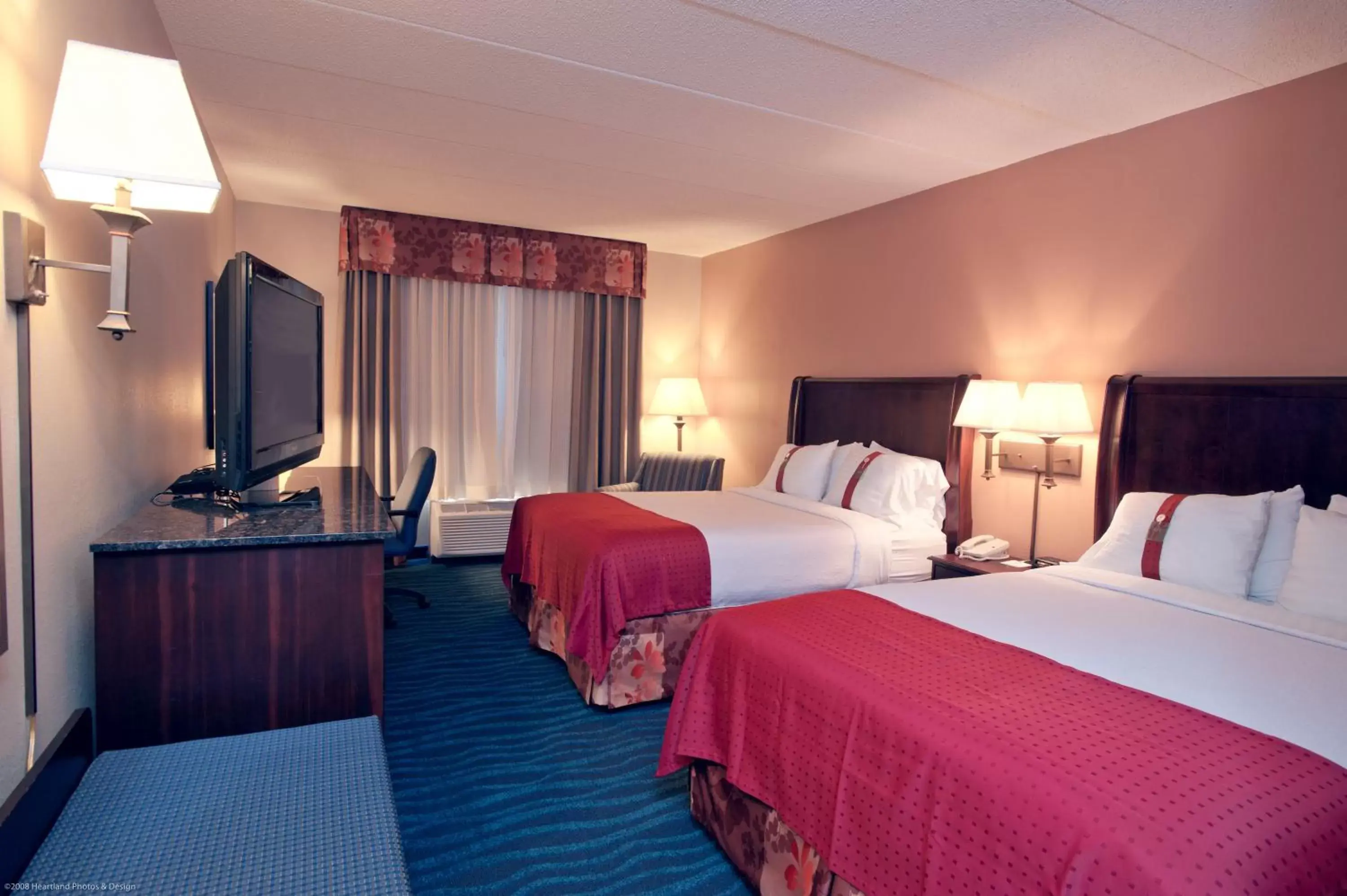 Bed in Holiday Inn Hotel & Suites Council Bluffs, an IHG Hotel