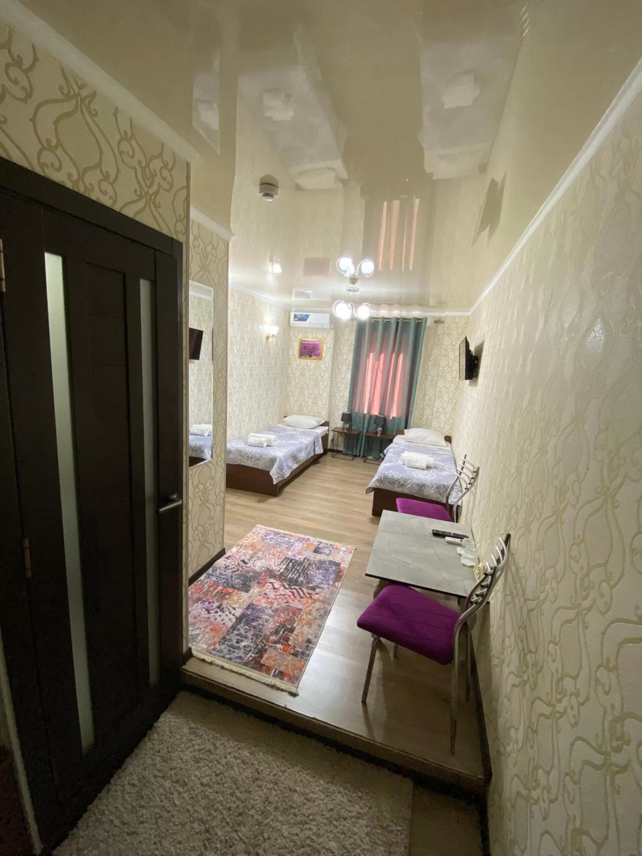 Bed in HOTEL UZBEGIM