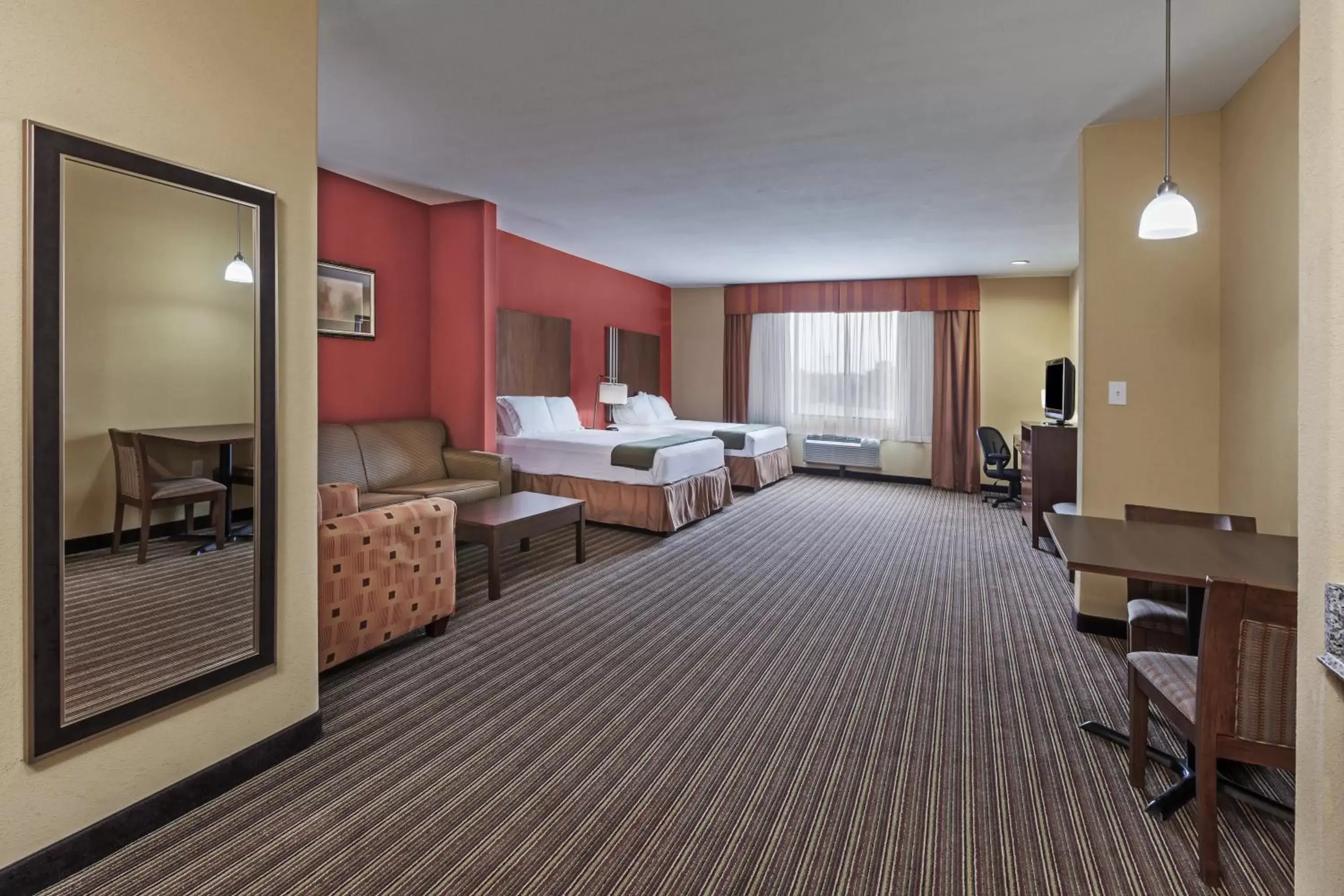 Bedroom in Holiday Inn Express & Suites Cleveland, an IHG Hotel