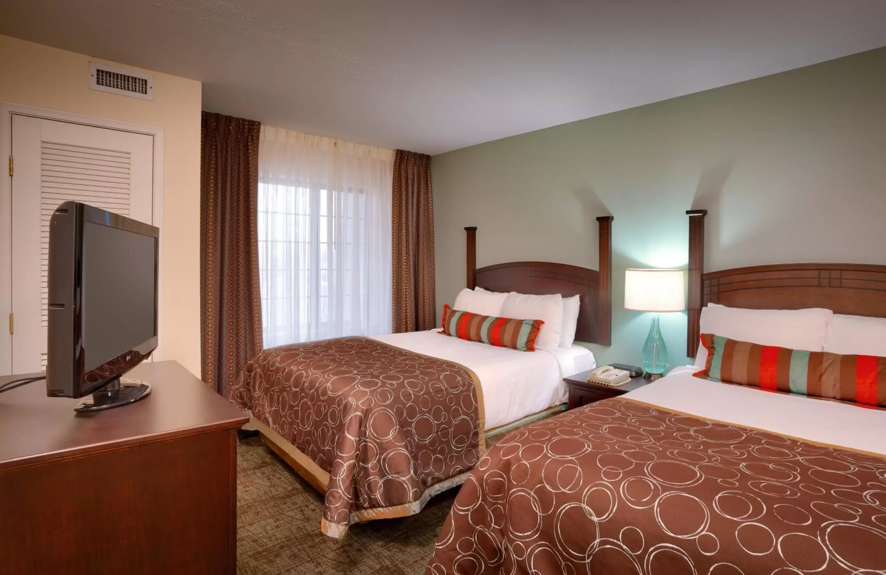 Photo of the whole room, Bed in Staybridge Suites Peoria Downtown, an IHG Hotel