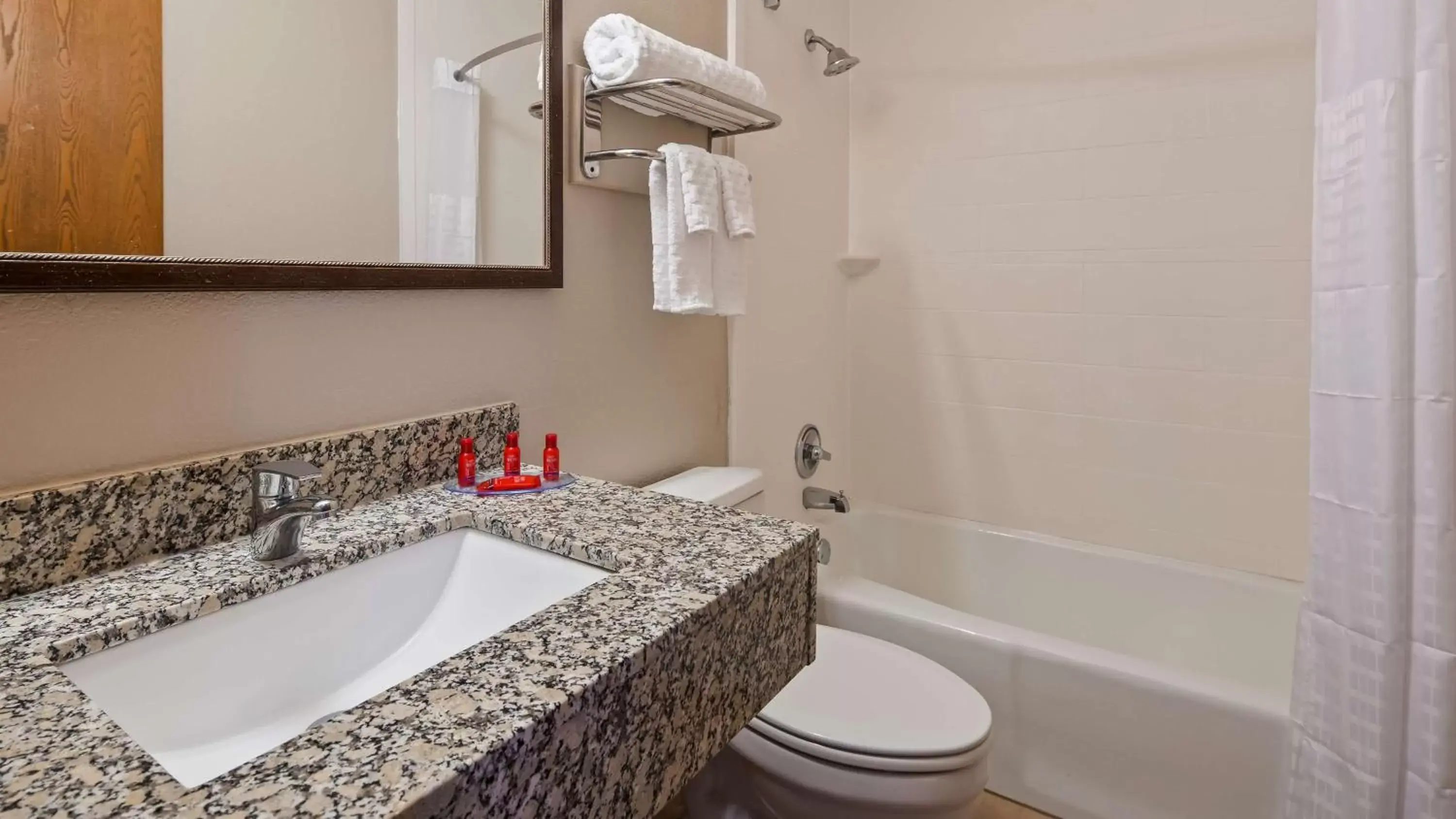 Bathroom in SureStay Hotel by Best Western Cedar Rapids