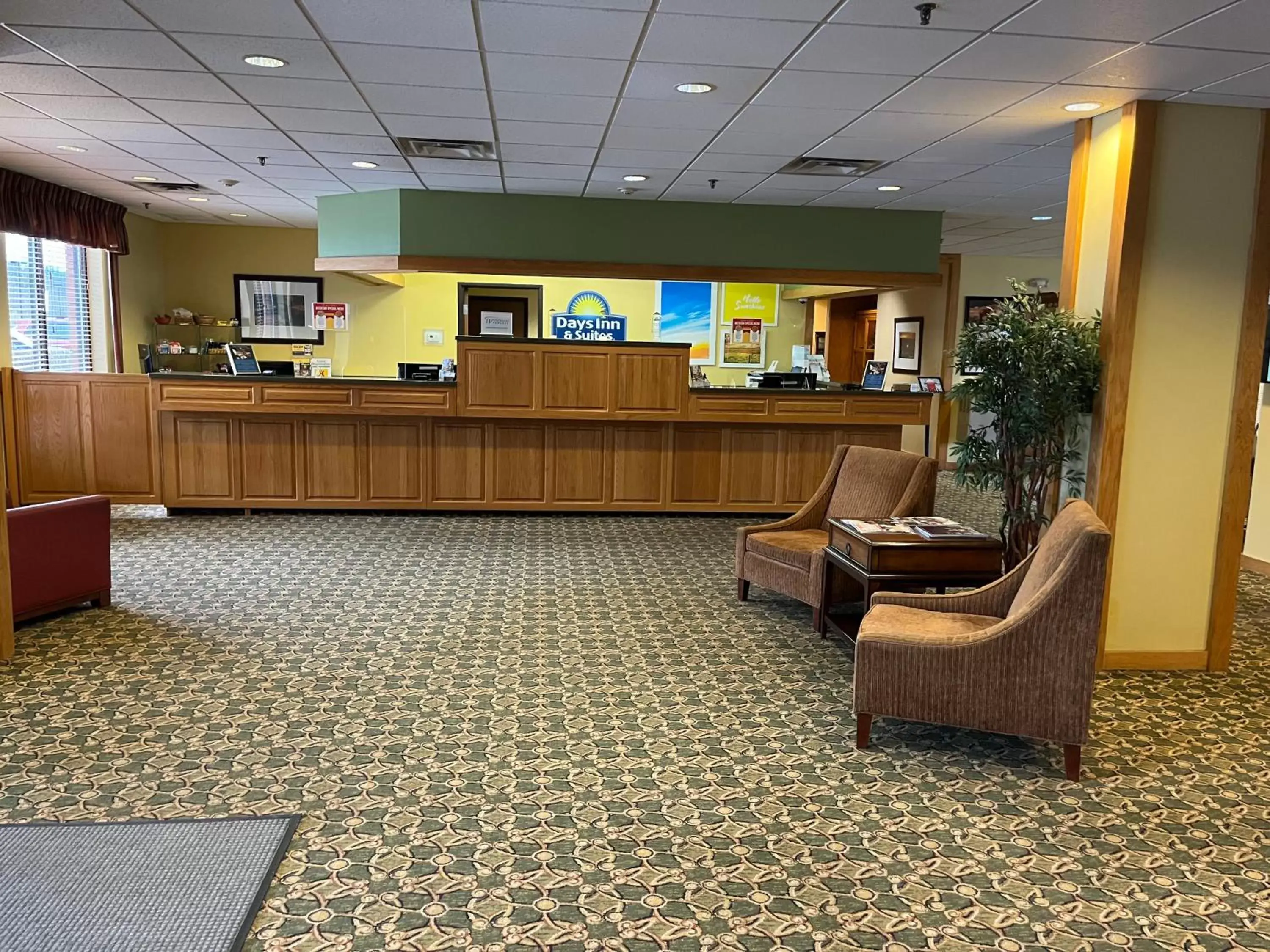 Lobby or reception in Days Inn & Suites by Wyndham Sutton Flatwoods Lobby or reception in Days Inn & Suites by Wyndham Sutton Flatwoods