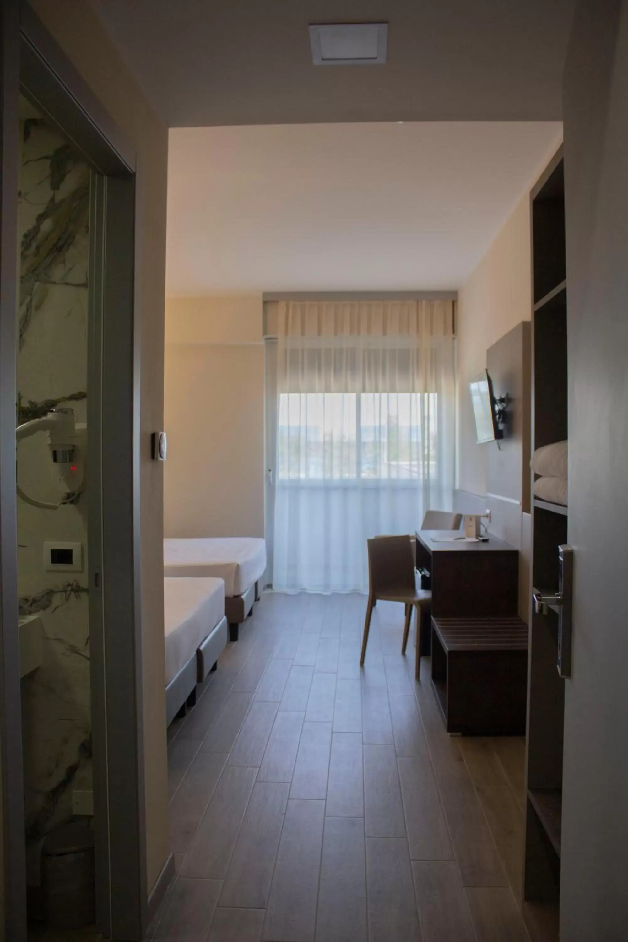 Bedroom, Seating Area in iH Hotels Bologna Gate 7