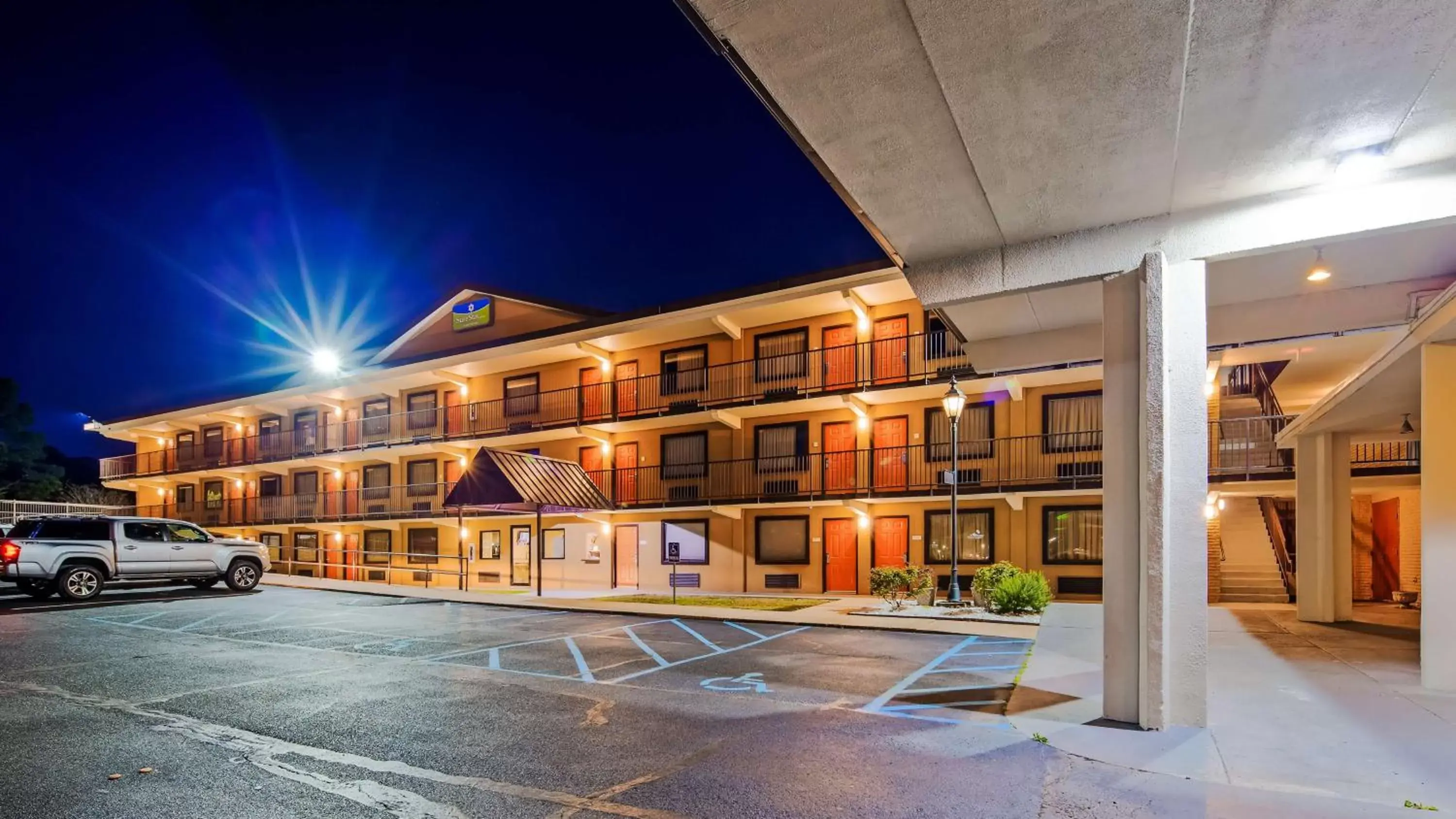 Property building in SureStay Hotel by Best Western Tupelo North