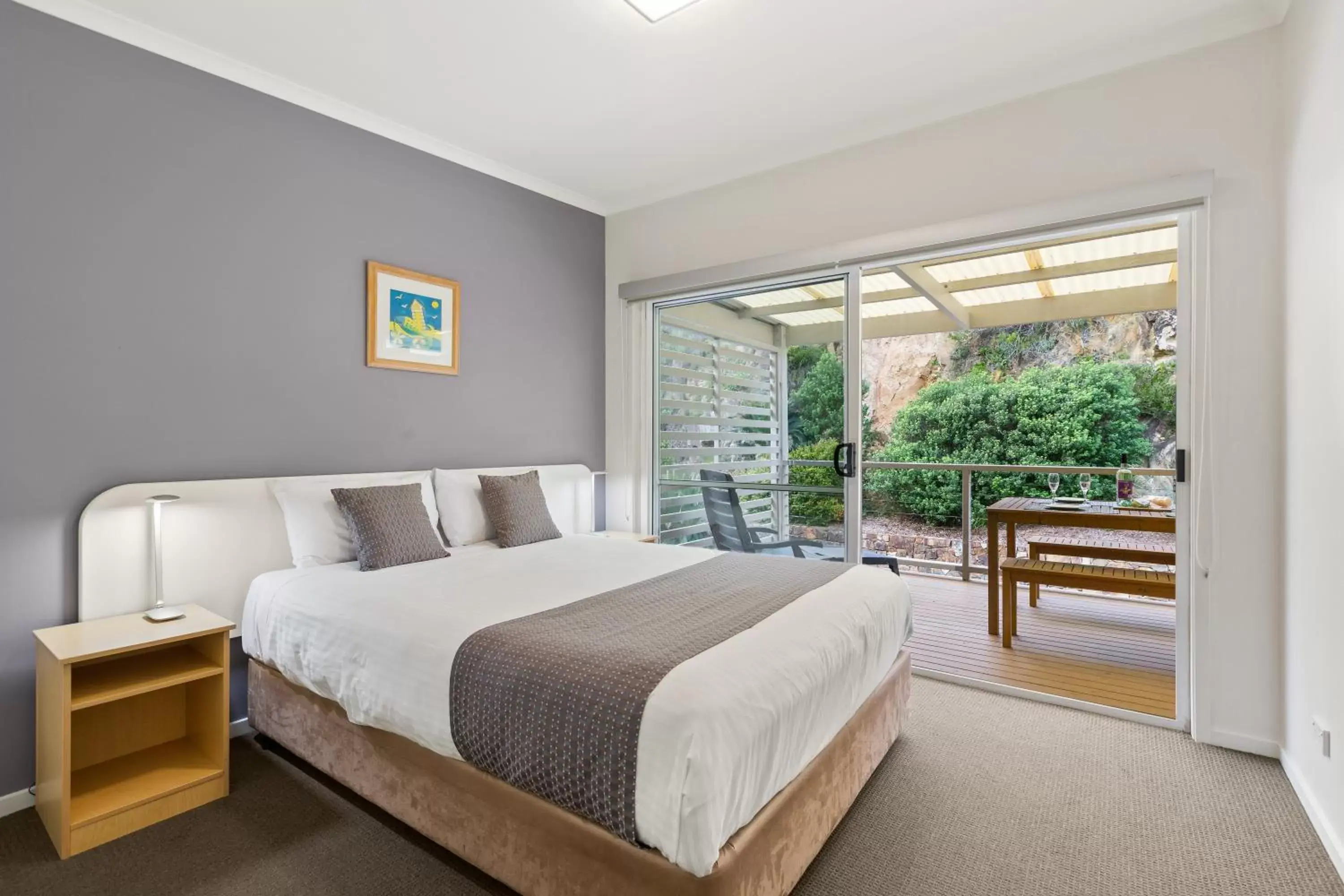 Bed in Tathra Beach House Holiday Apartments