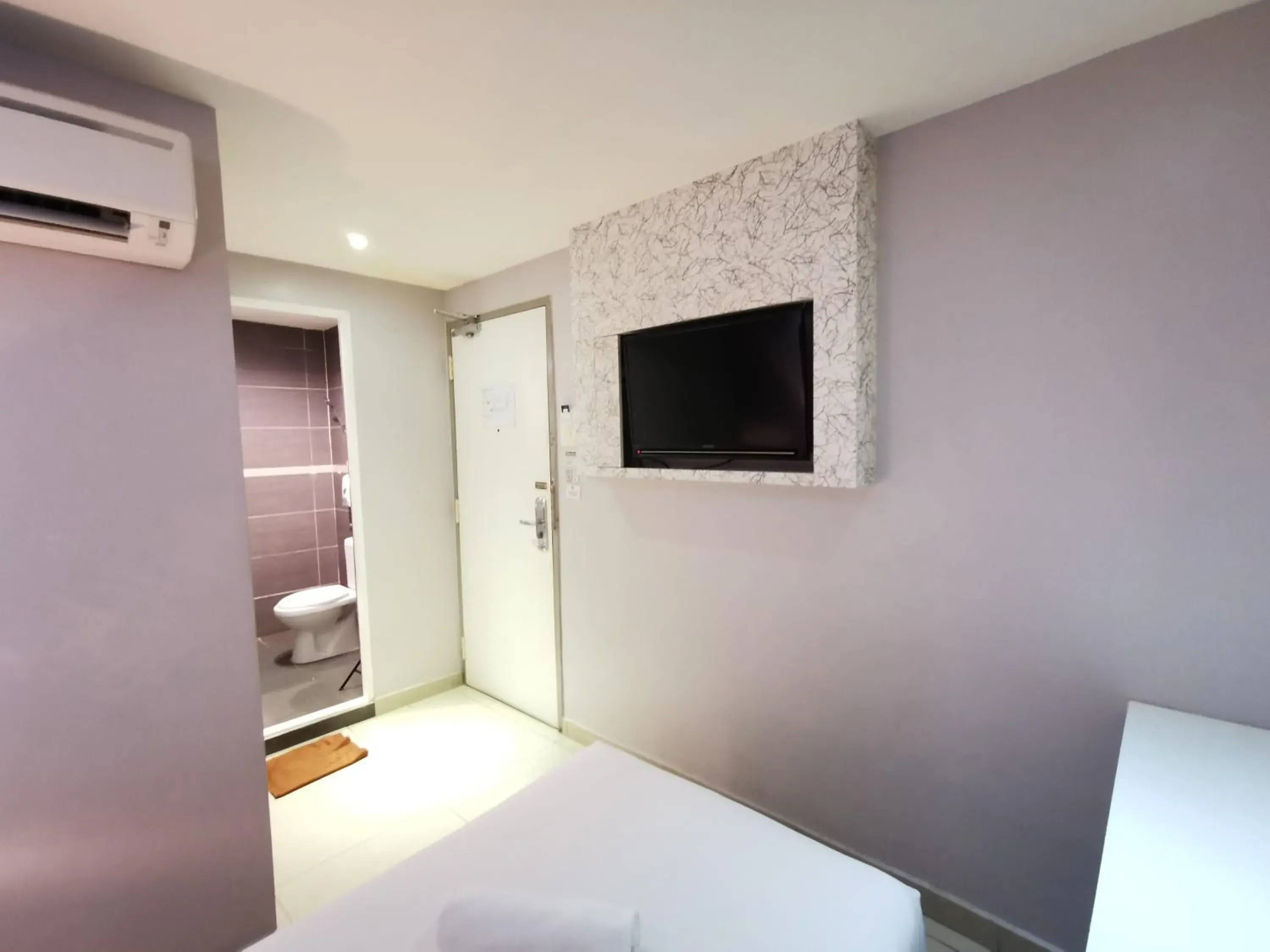 TV and multimedia, TV/Entertainment Center in Bluemoon Boutique Hotel