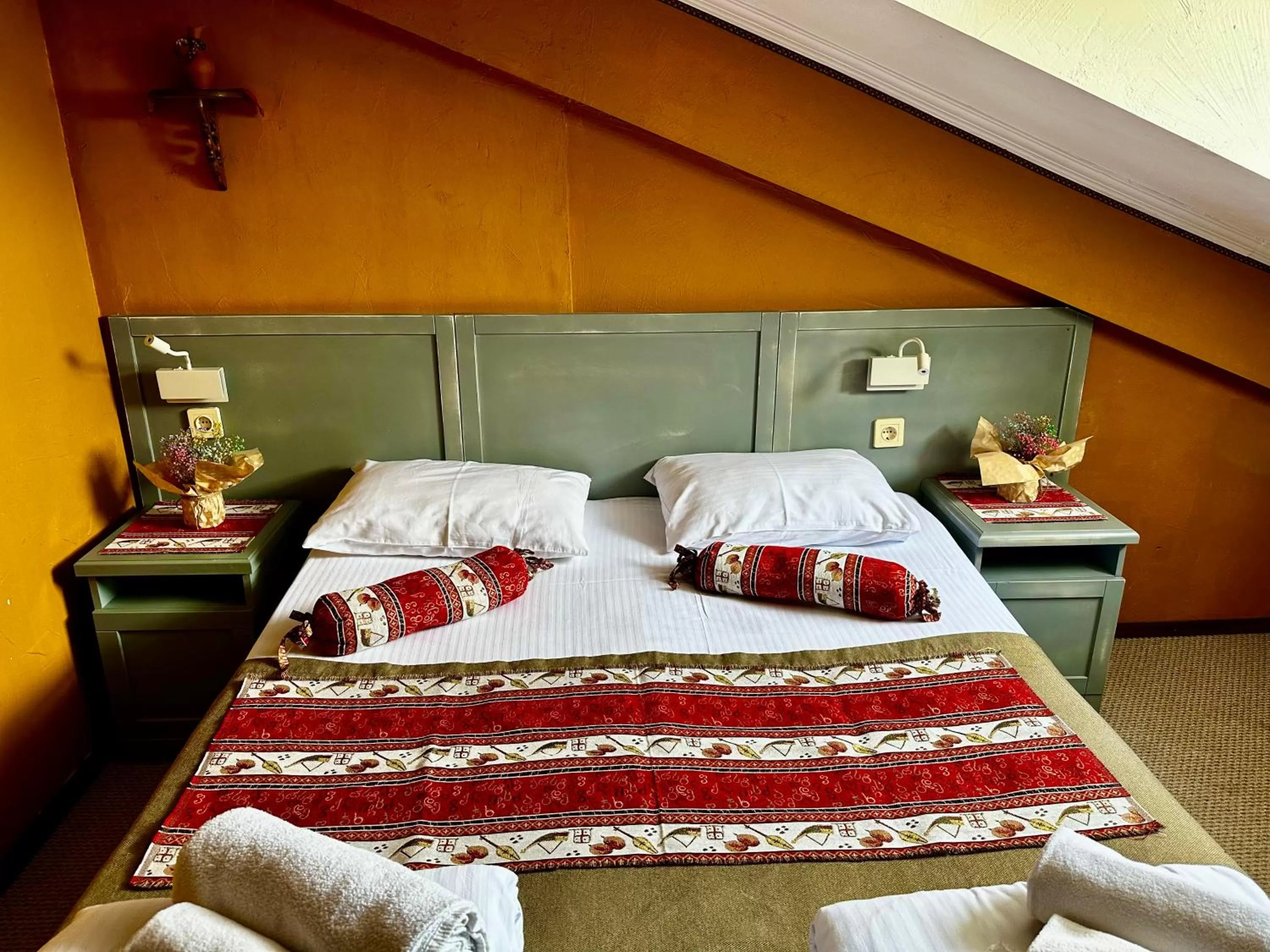 Bed in Kindli Boutique Hotel