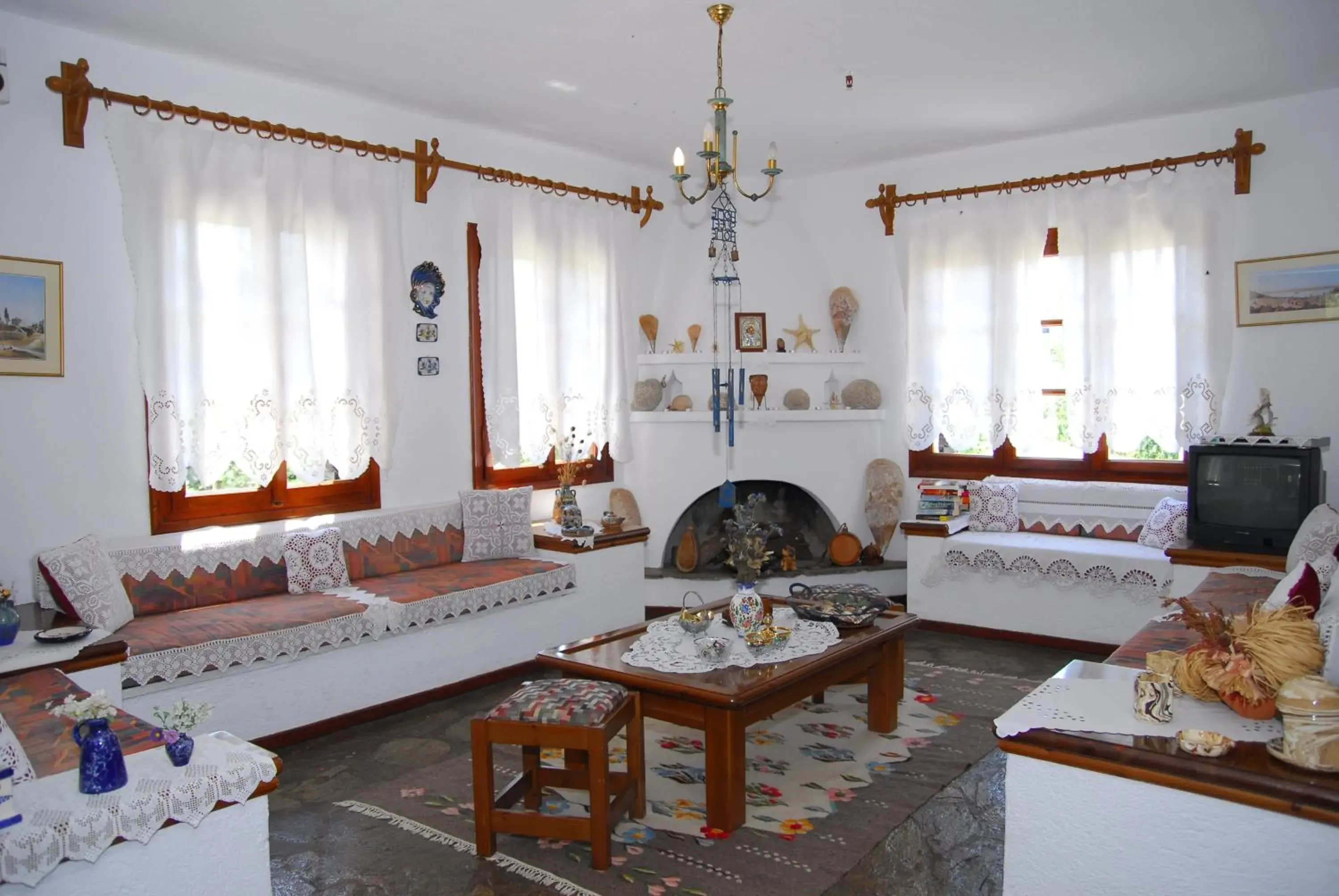 Communal lounge/ TV room, Seating Area in Afroditi