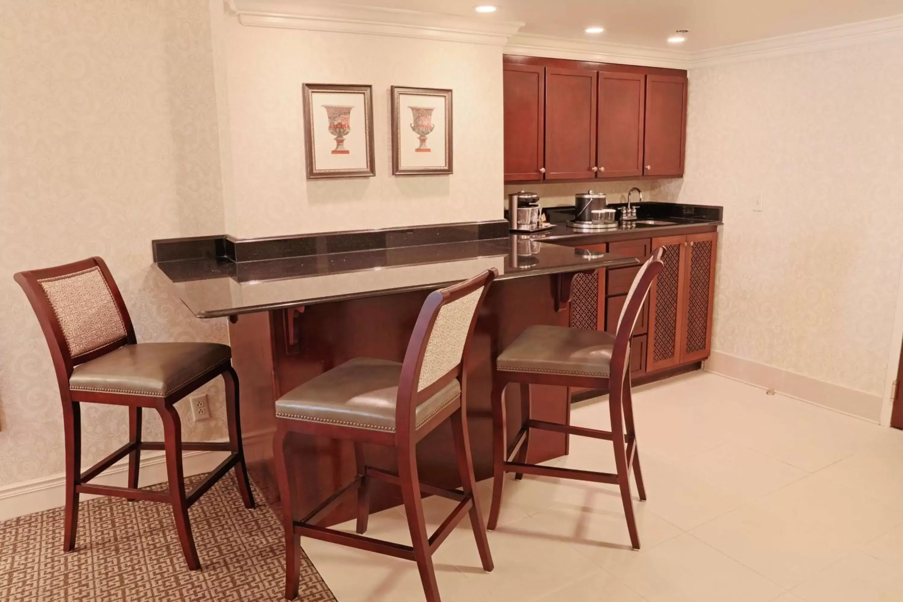 Kitchen or kitchenette, Dining Area in Hotel Roanoke & Conference Center, Curio Collection by Hilton