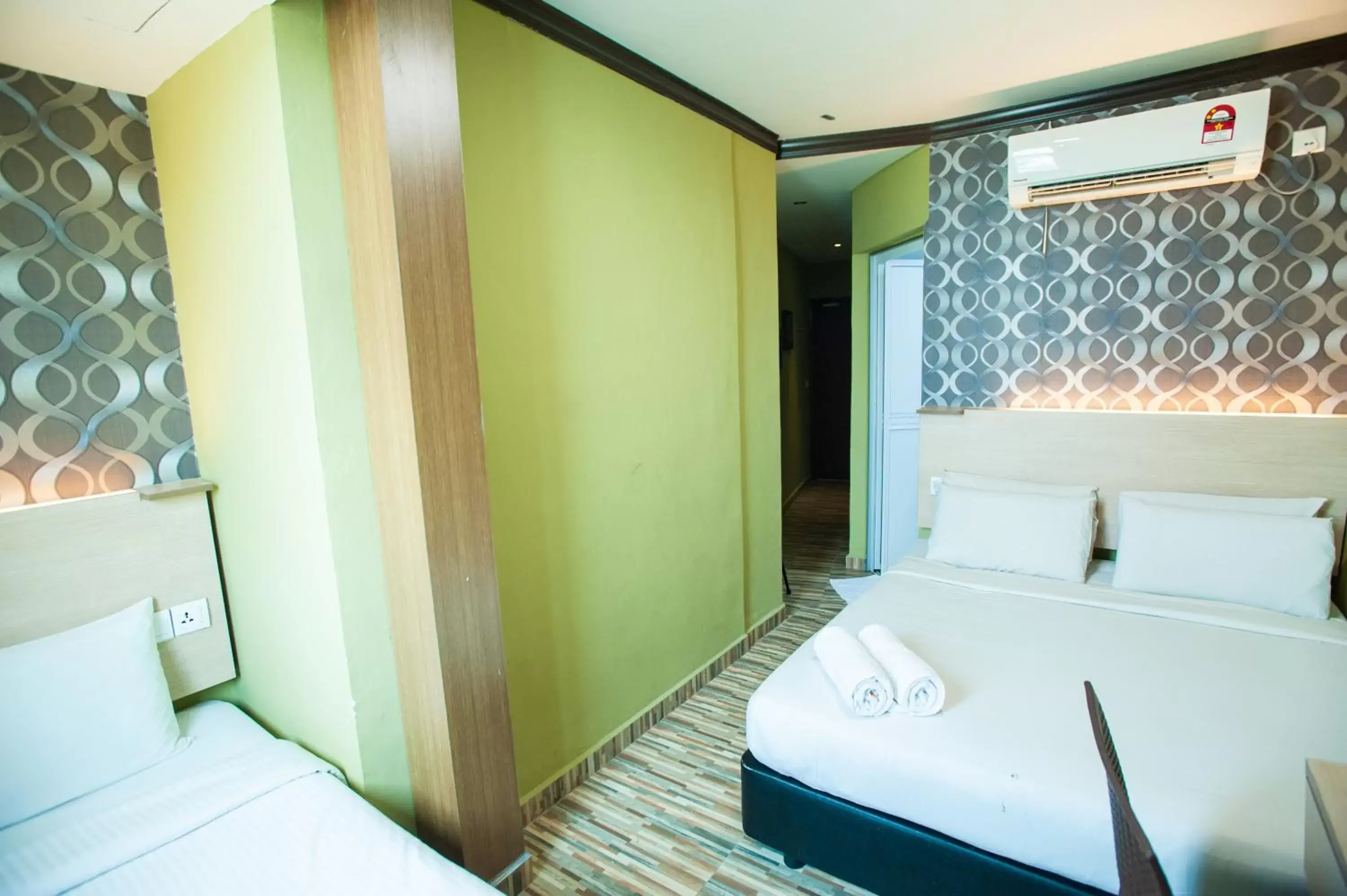 Photo of the whole room, Bed in DJ Citi Point Hotel