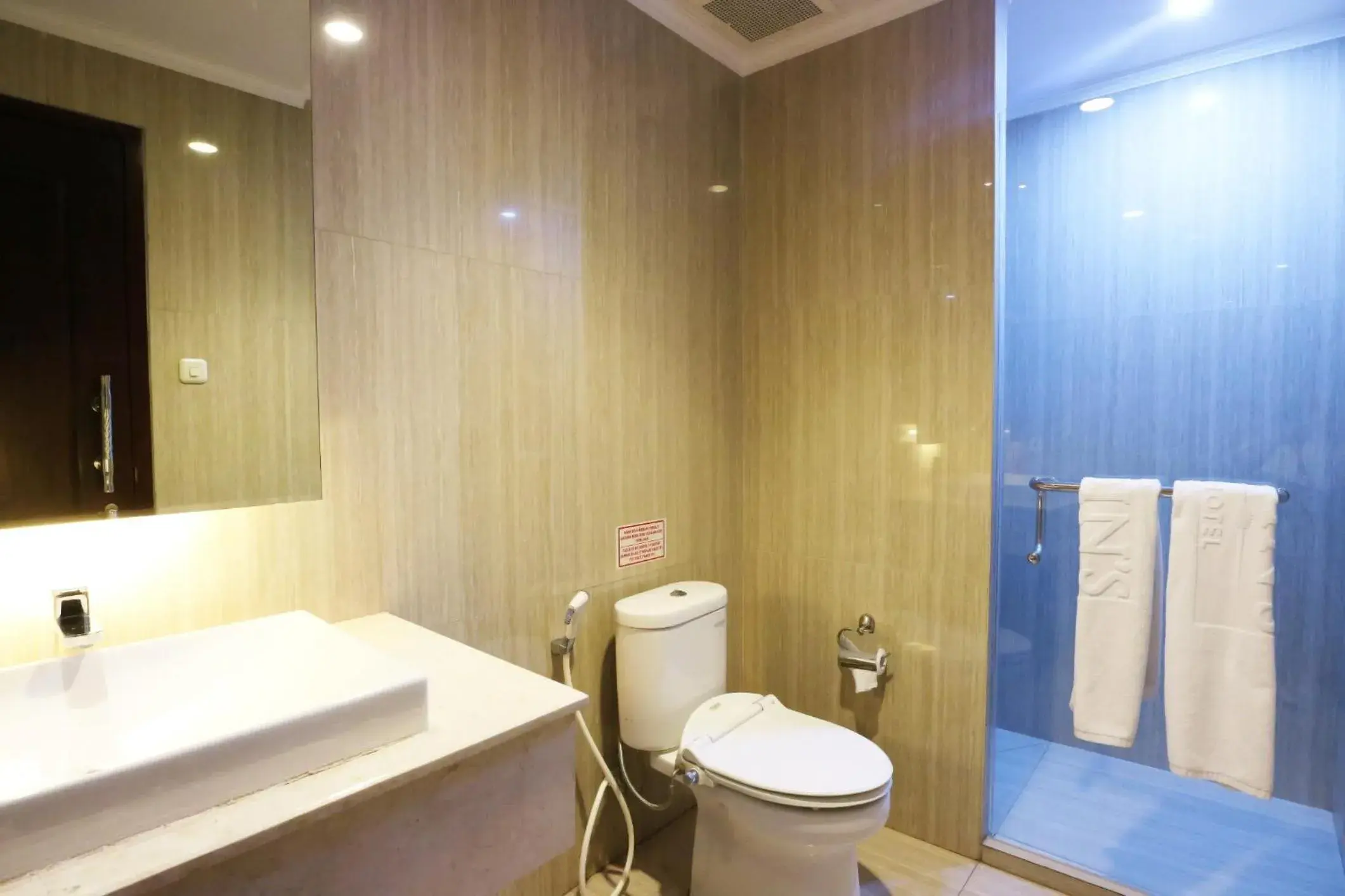 Bathroom in Coins Hotel Jakarta