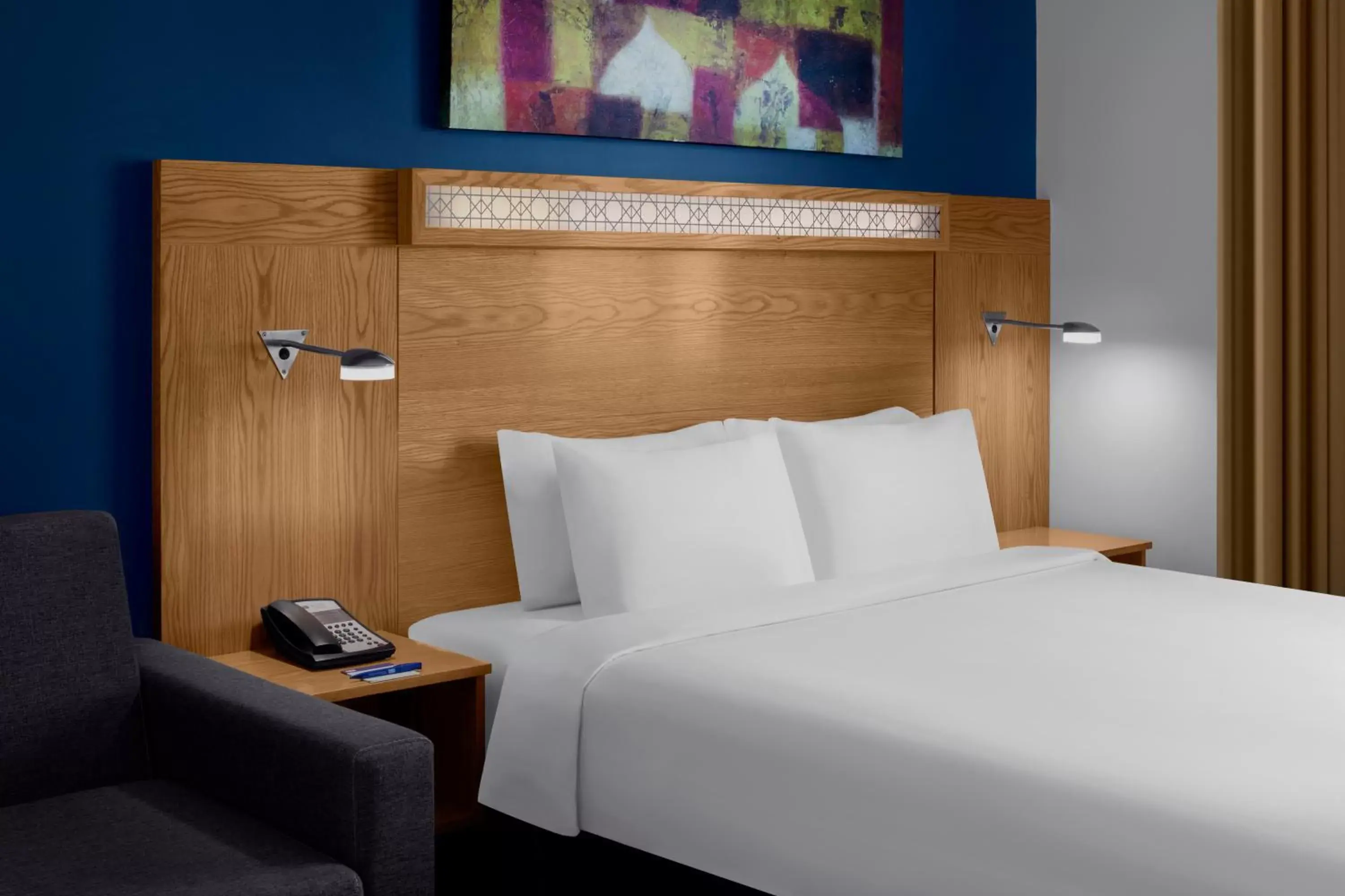 Bed in Holiday Inn Express Dubai Airport, an IHG Hotel