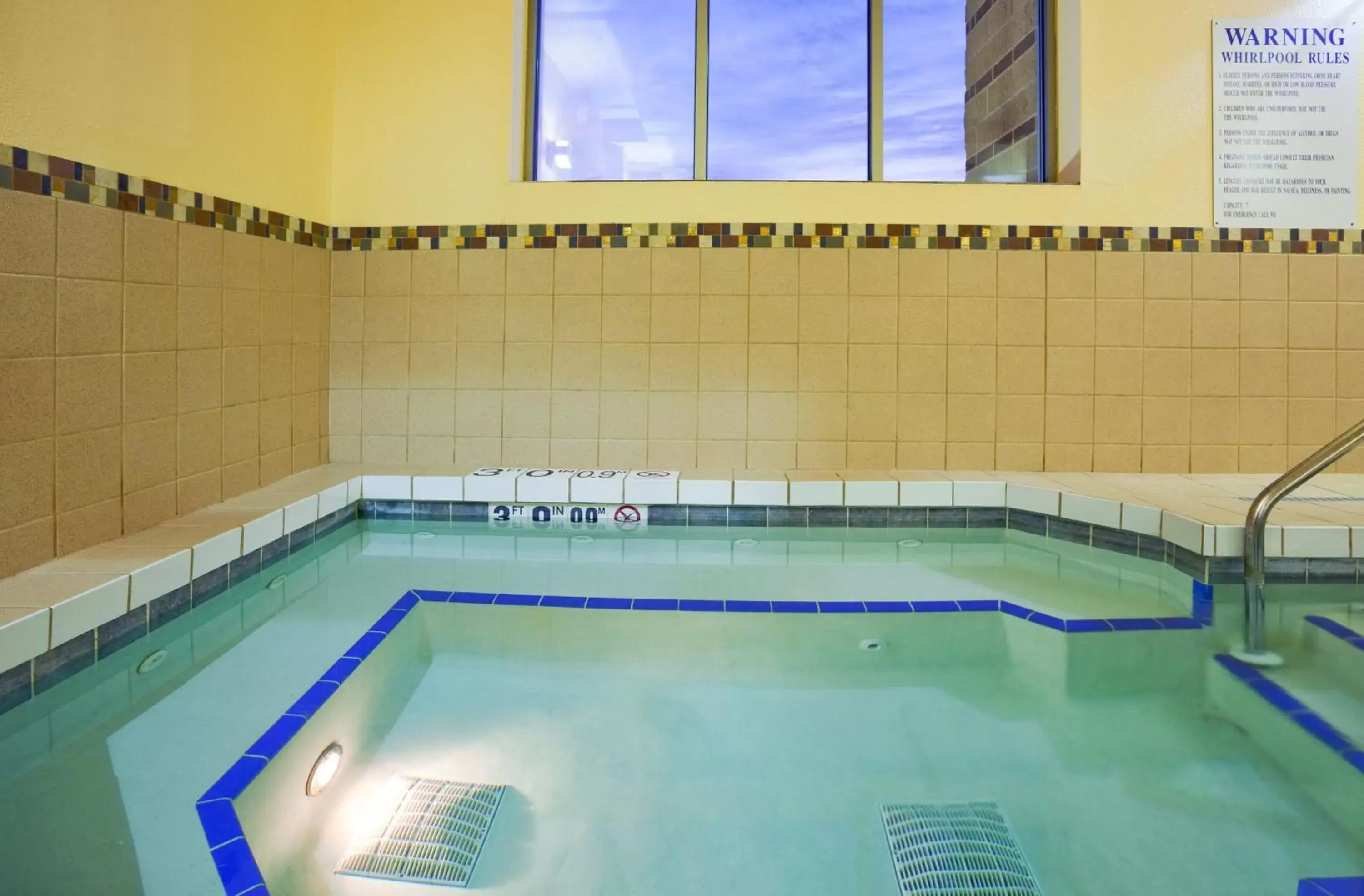 Swimming Pool in Holiday Inn & Suites Green Bay Stadium, an IHG Hotel