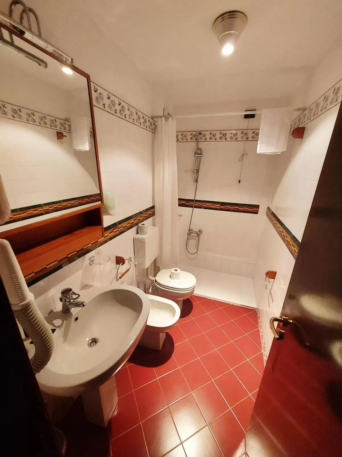 Bathroom in HG Hotel Italia