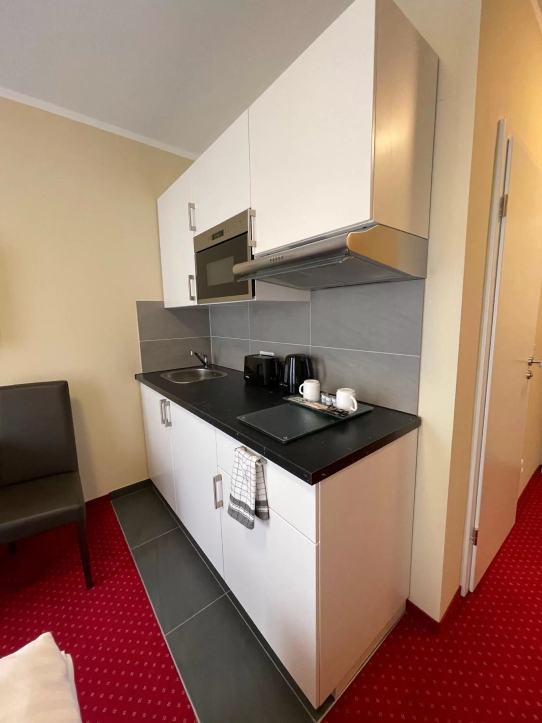 Kitchen or kitchenette in Palm Premium Hotel & Apartments