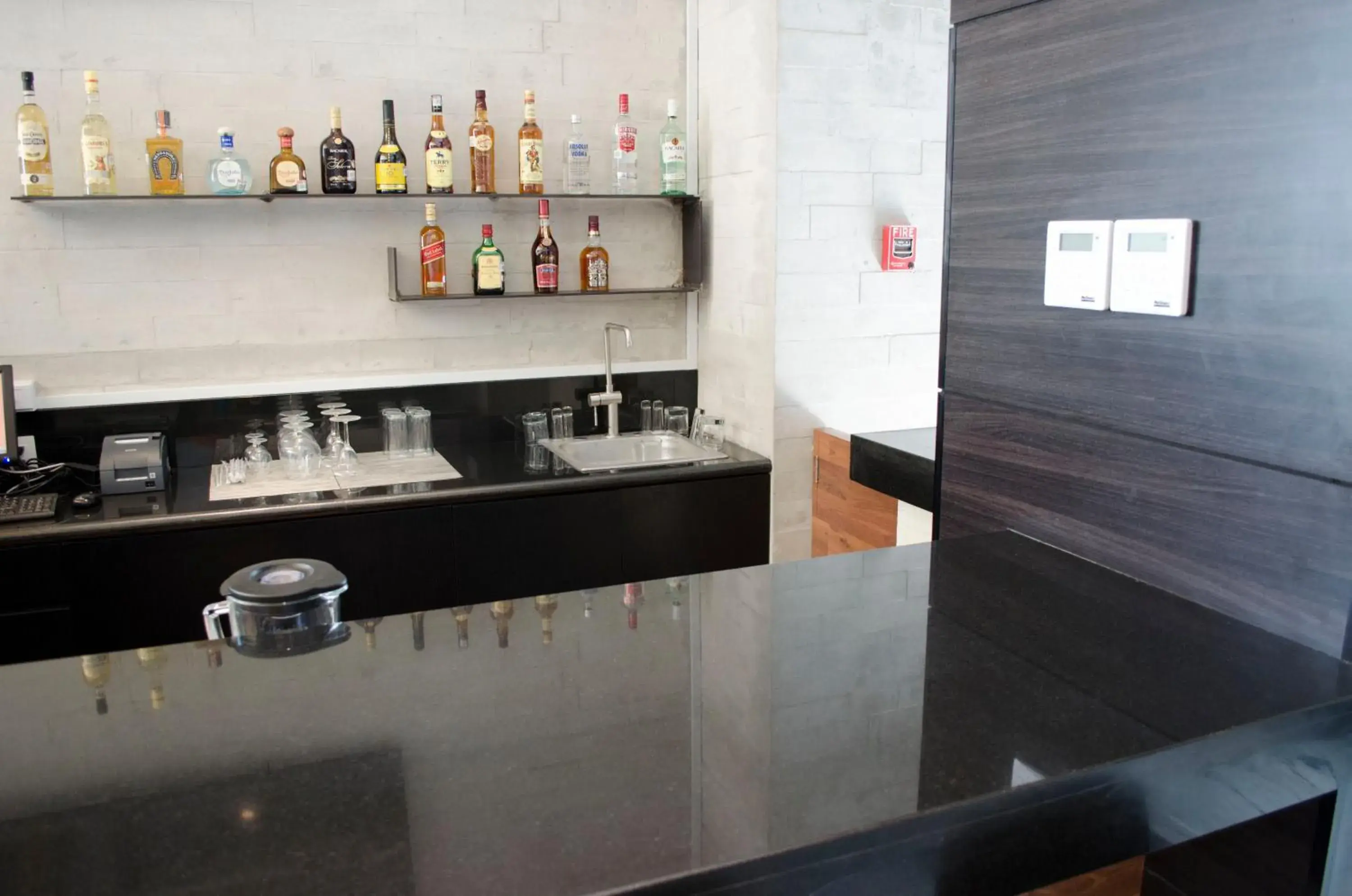 Lounge or bar, Kitchen/Kitchenette in Casa Inn Business Irapuato