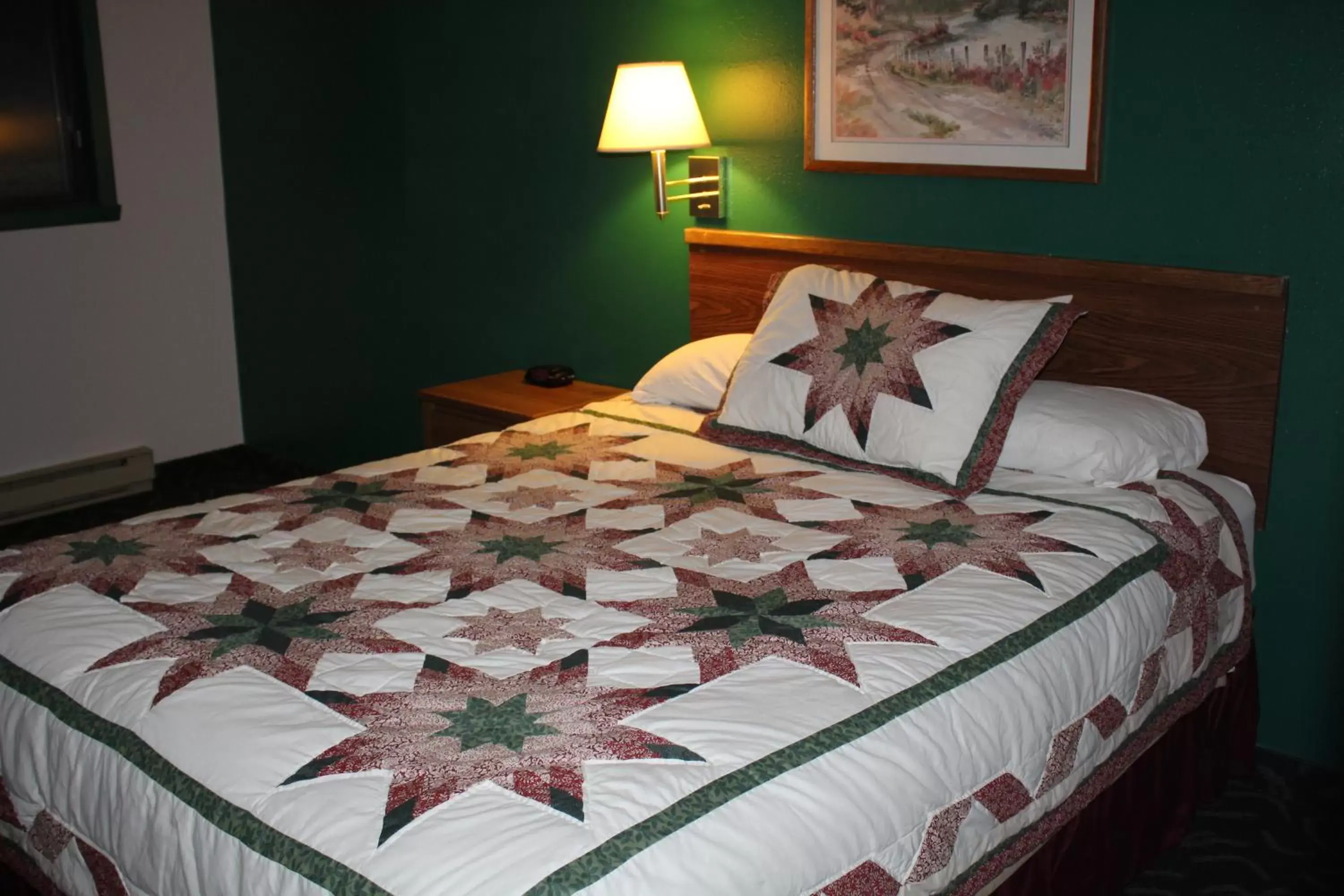 Photo of the whole room, Bed in Rodeway Inn Gateway to Medora T-Roosevelt & Makoshika State Park