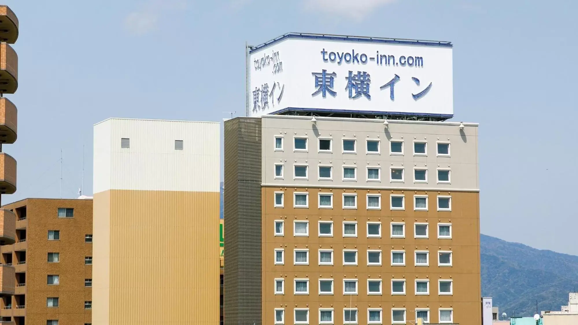 Property logo or sign, Property Building in Toyoko Inn Tsuruga Ekimae