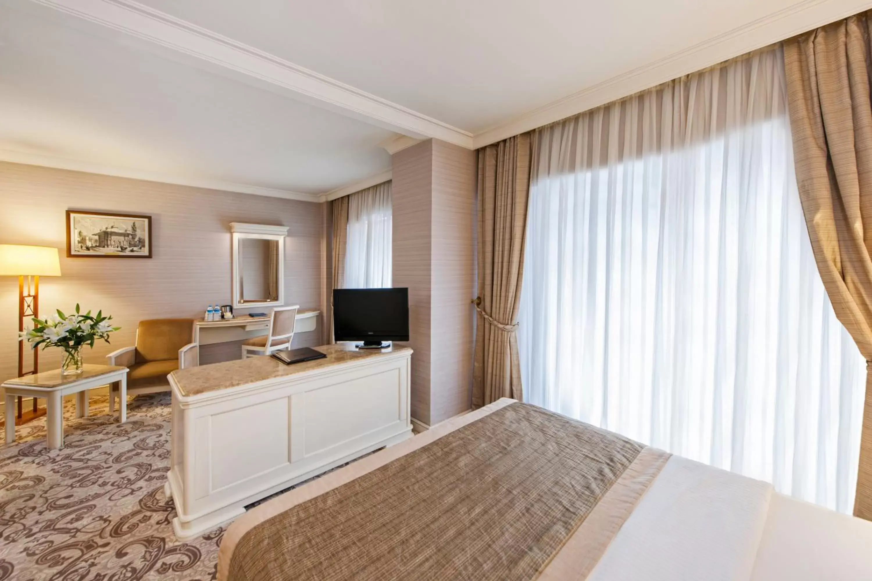 Bed, TV/Entertainment Center in Elite World Comfy Istanbul Taksim