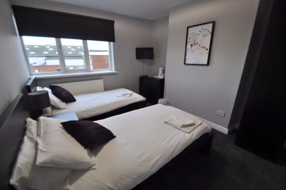 Photo of the whole room, Bed in The Embassy Hotel