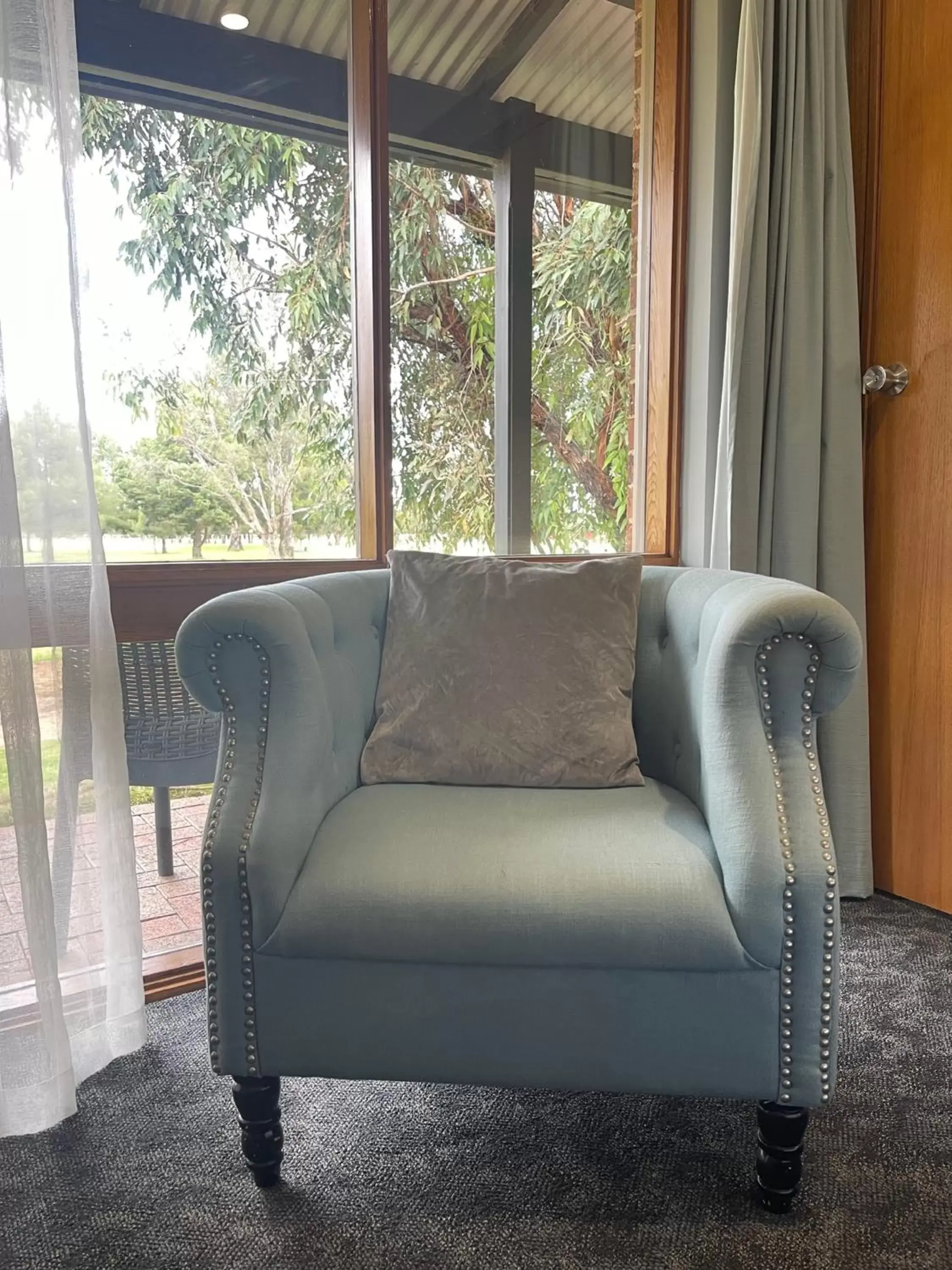 Bedroom, Seating Area in Town & Country Motor Inn