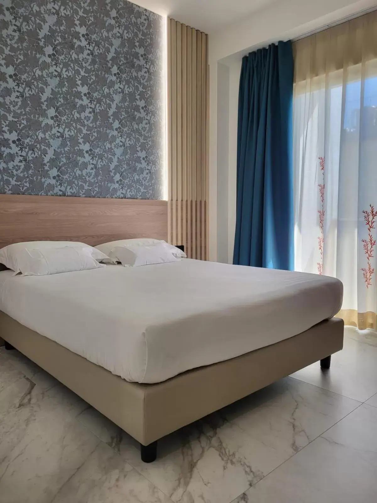 Bed in Hotel Maiuri Pompei