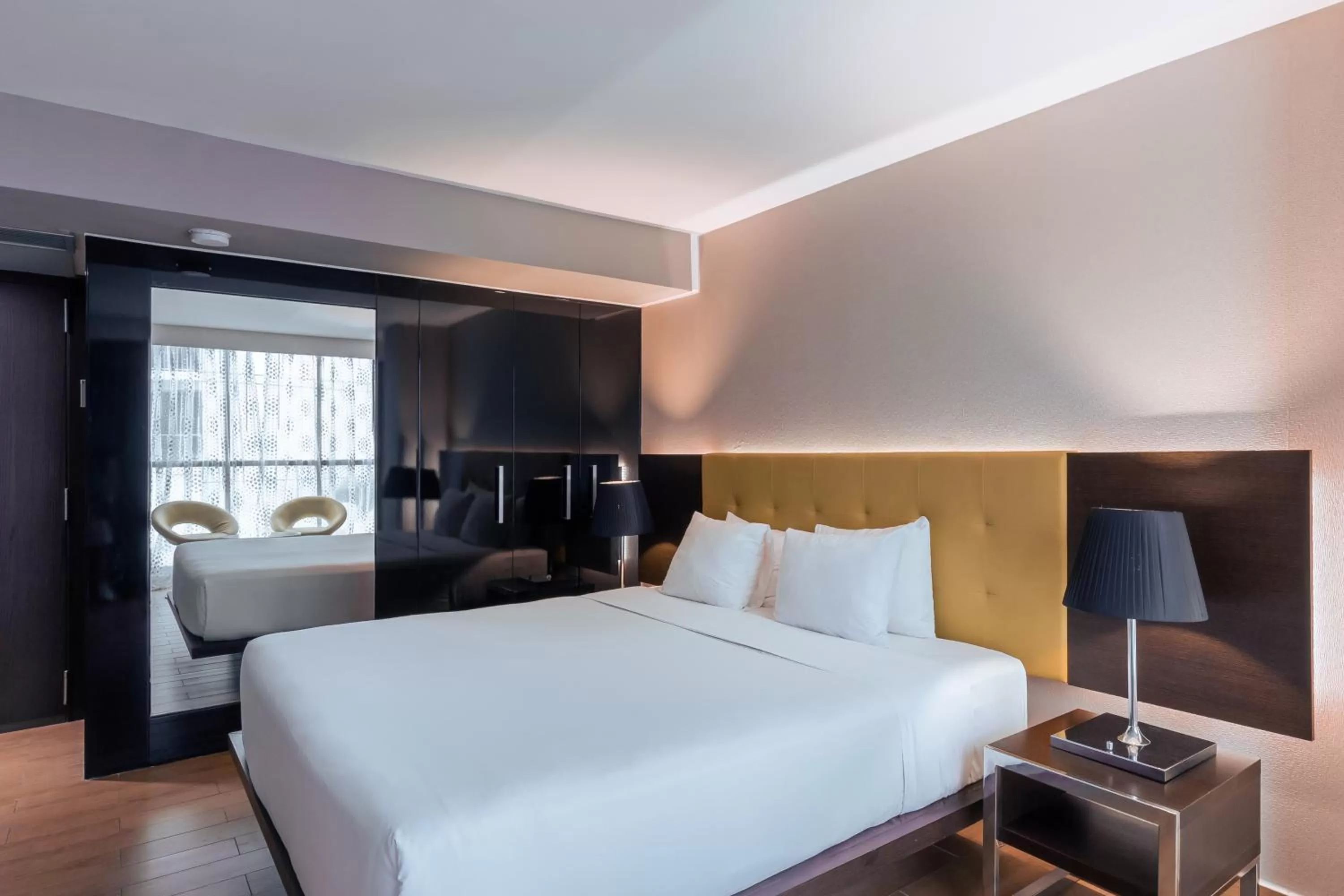 Photo of the whole room, Bed in Exe Oriental Panamá