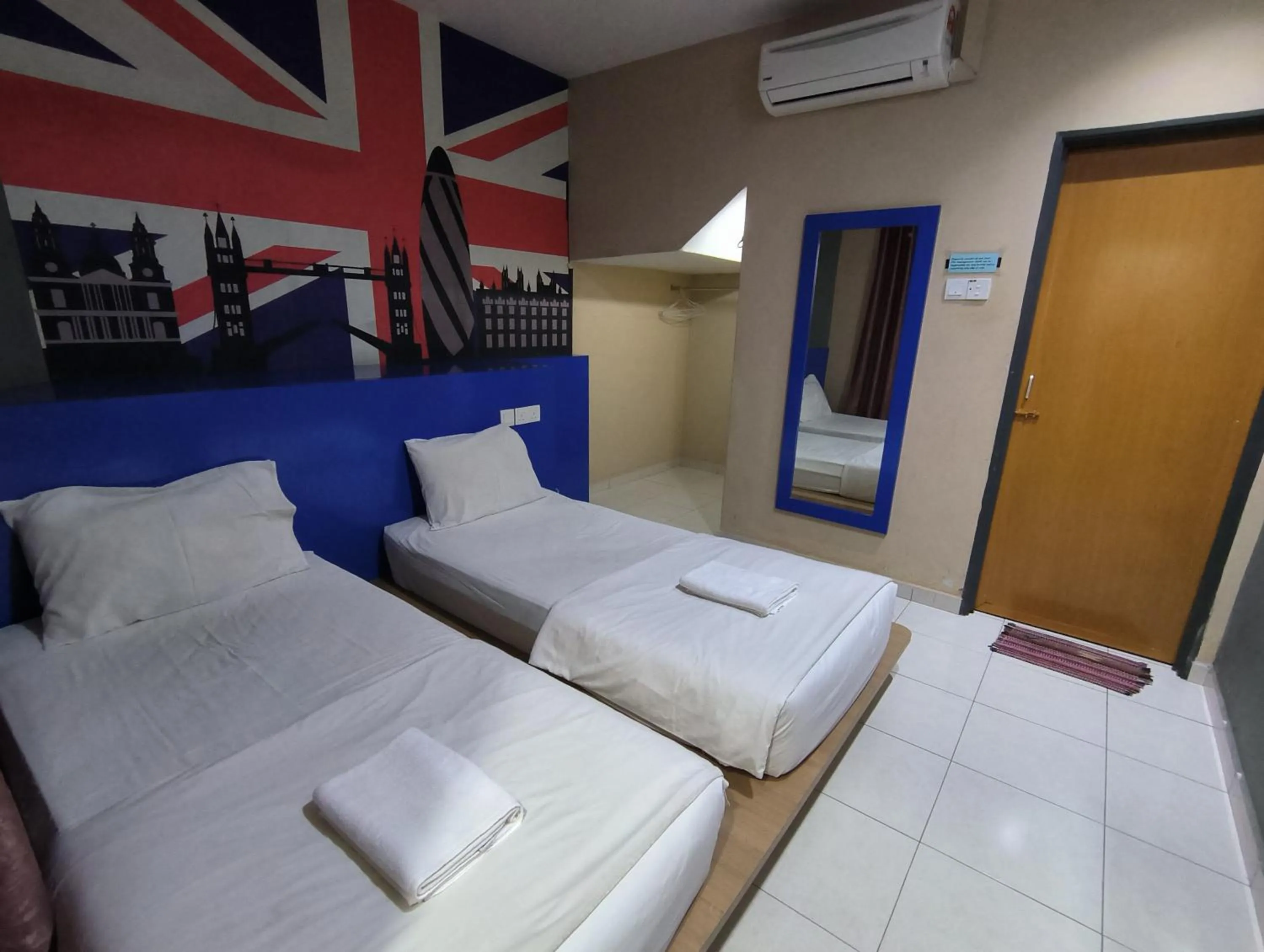 Bed in GOLDEN GUEST HOUSE KUANTAN