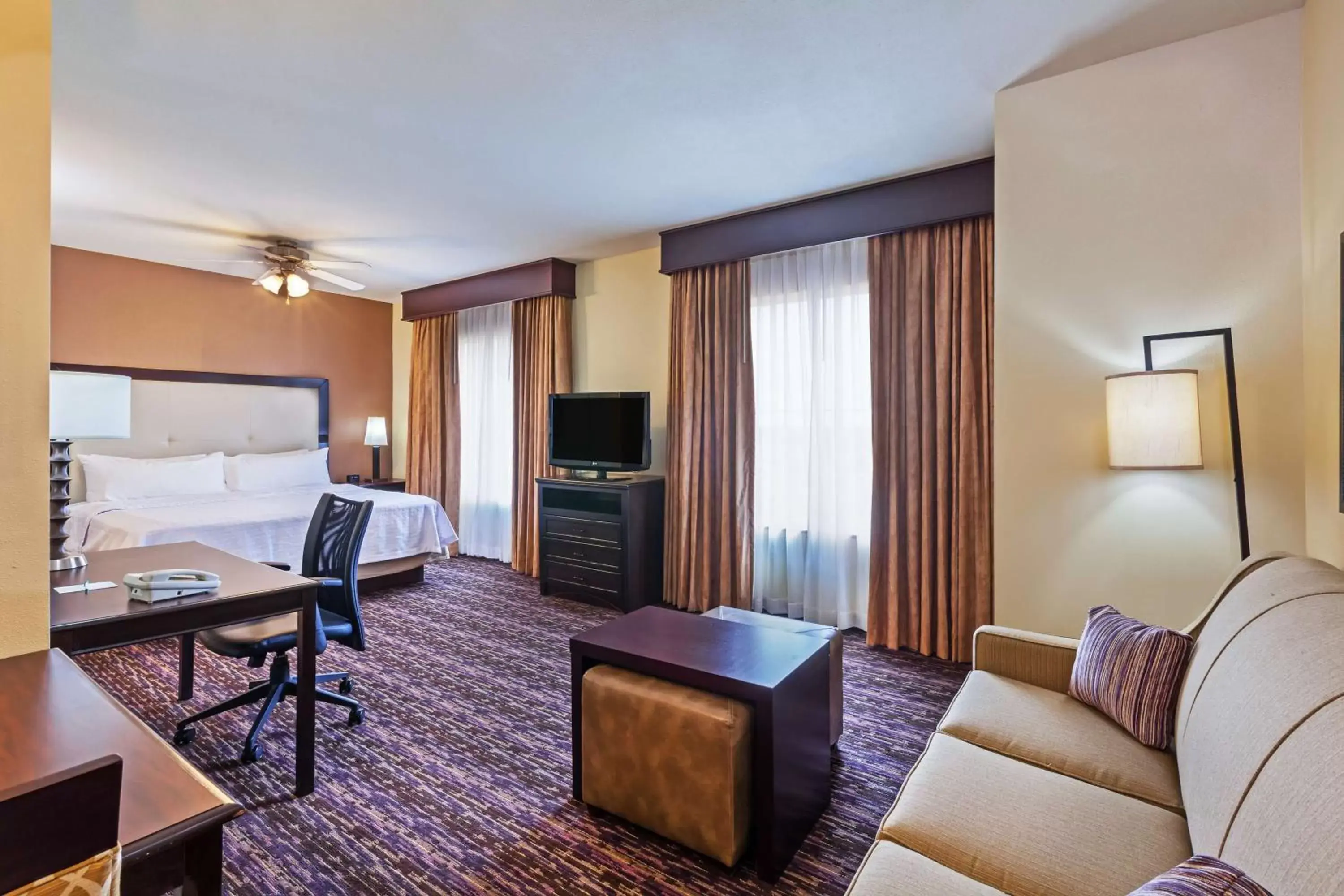 Bedroom, TV/Entertainment Center in Homewood Suites Wichita Falls