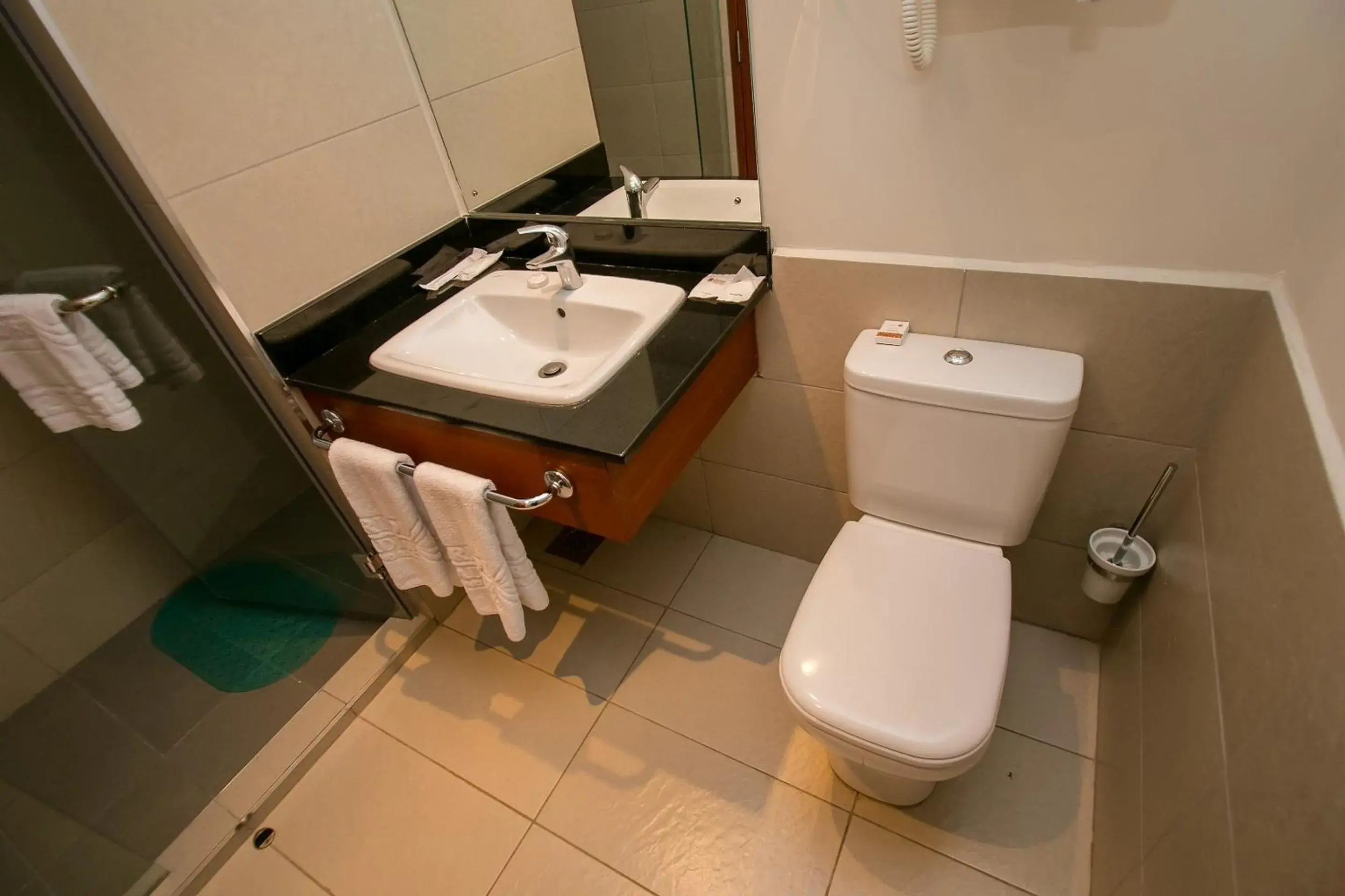 Bathroom in Waridi Paradise Hotel and Suites