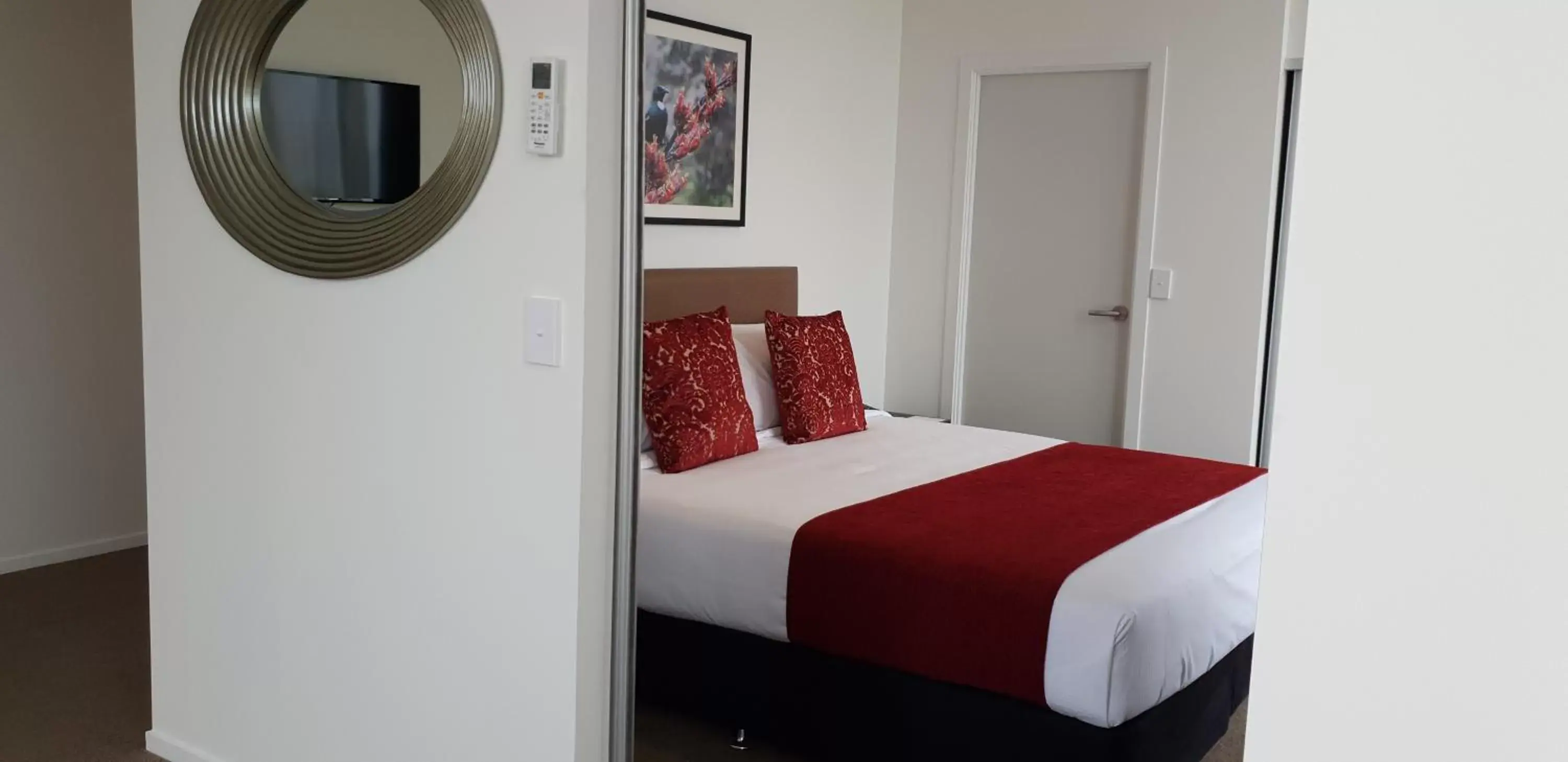 Bedroom, Bed in Ramada Suites by Wyndham Manukau