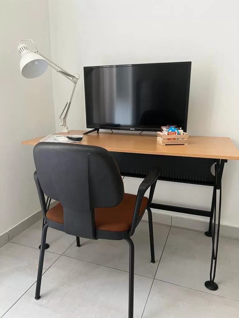 Communal lounge/ TV room, TV/Entertainment Center in Napoleò