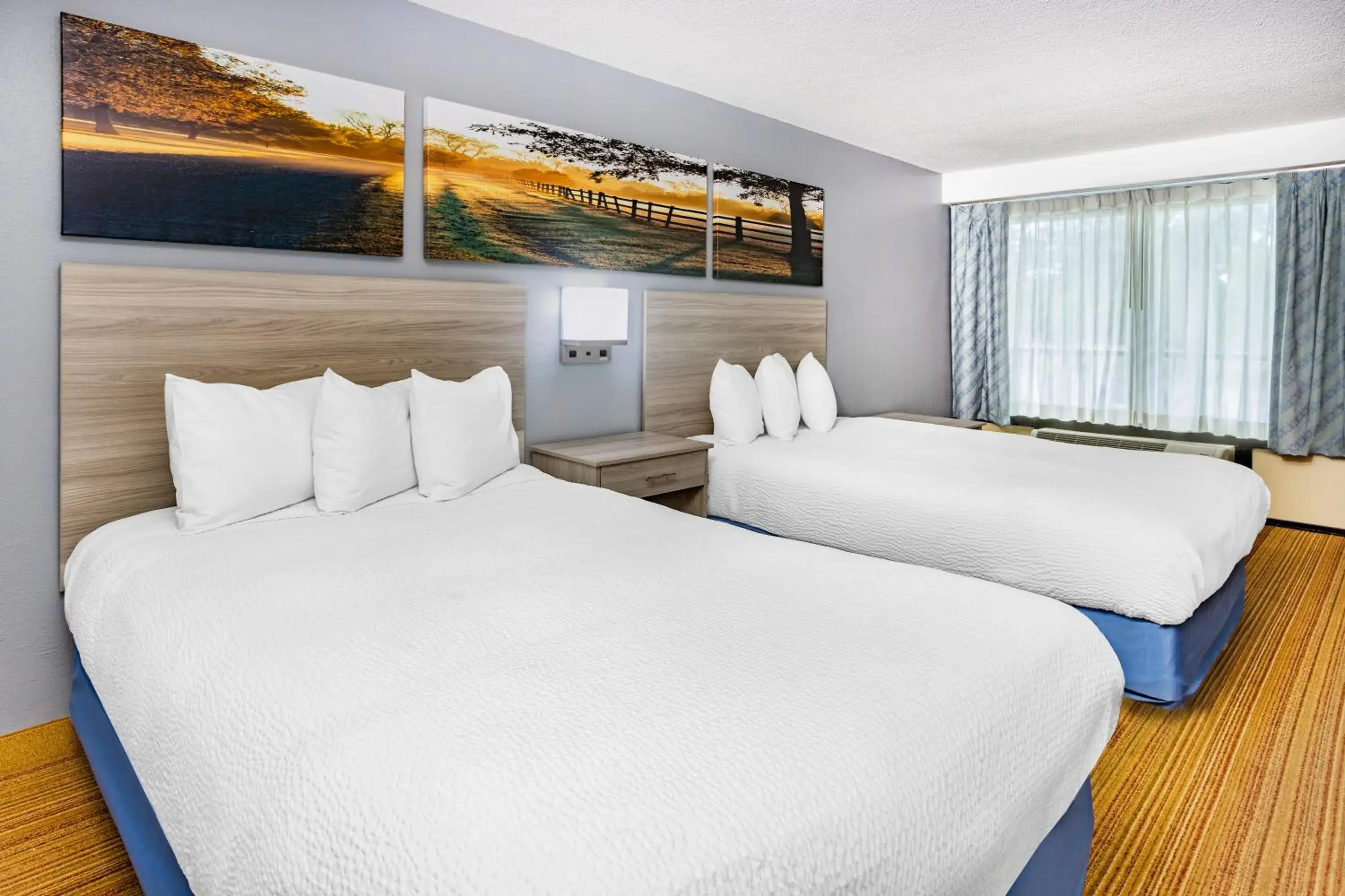 Photo of the whole room, Bed in Days Inn & Suites by Wyndham Colonial
