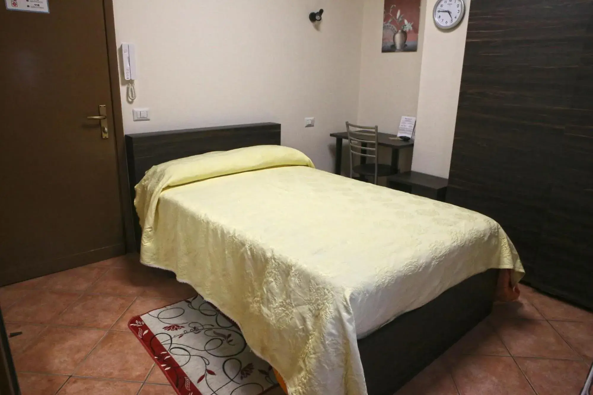 Bed in Albergo Gusmeroli