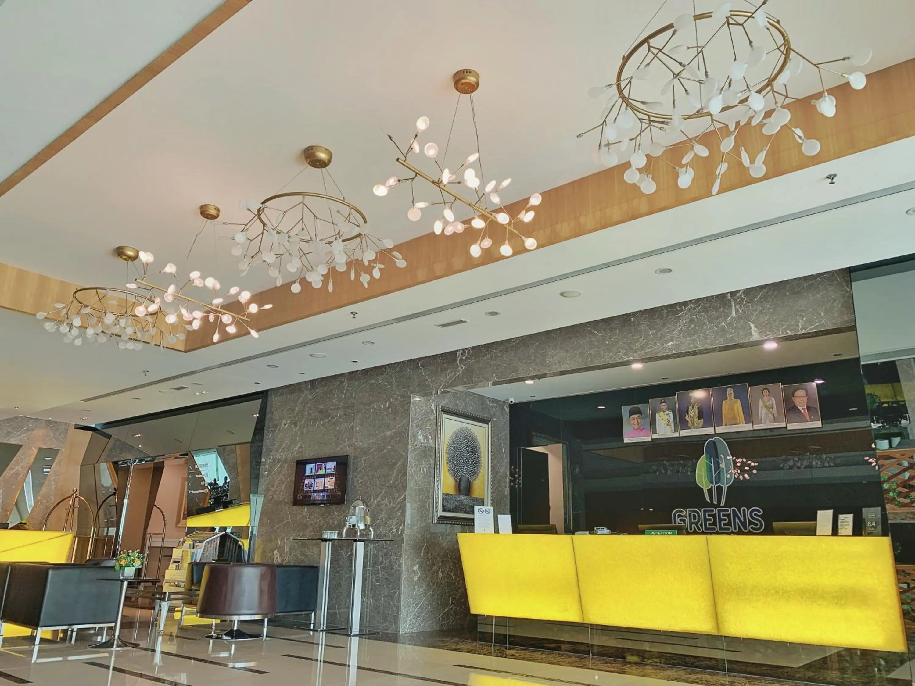 Lobby or reception in Greens Hotel & Suites