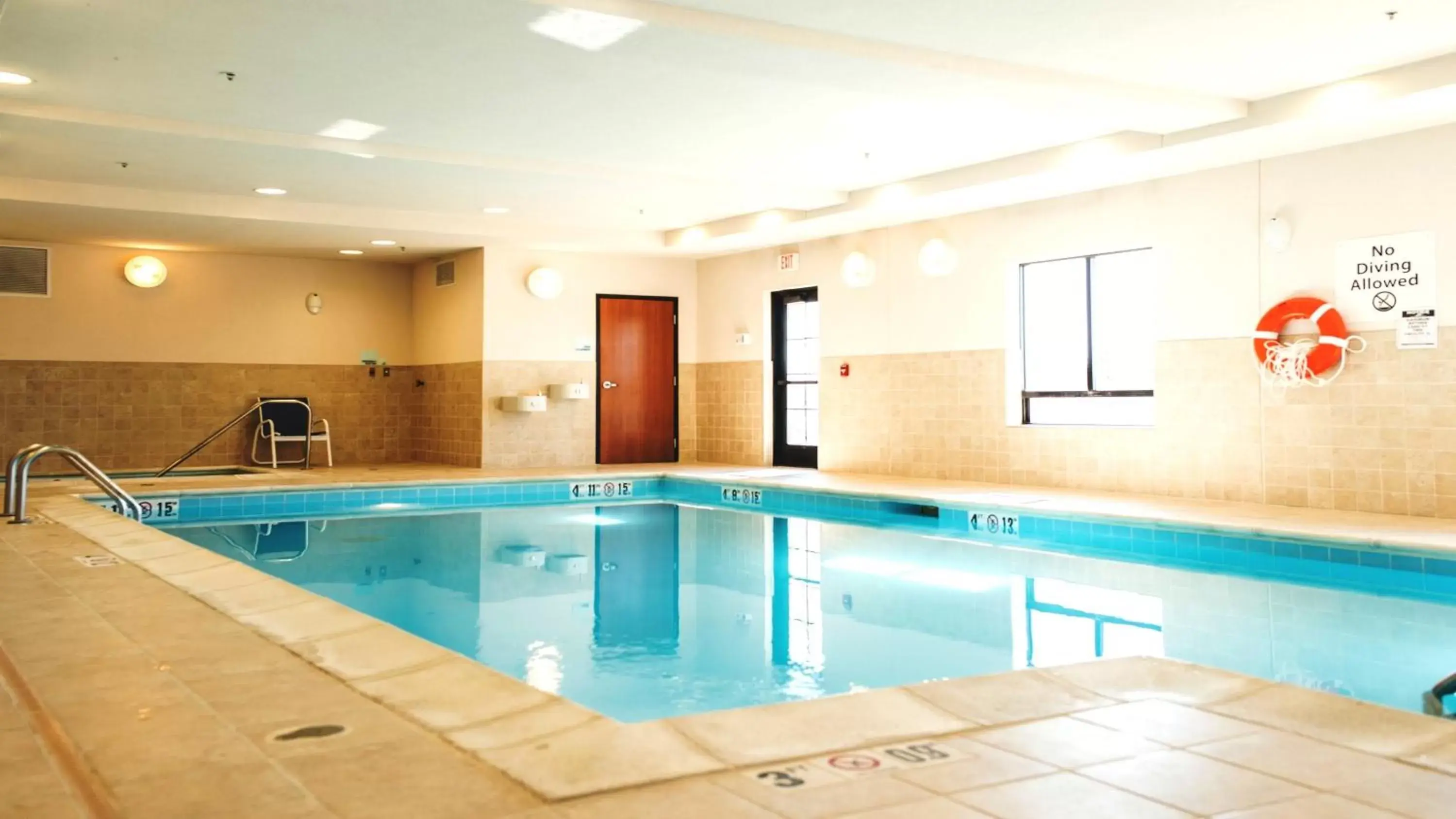 Swimming Pool in Holiday Inn Express & Suites Morton Peoria Area, an IHG Hotel