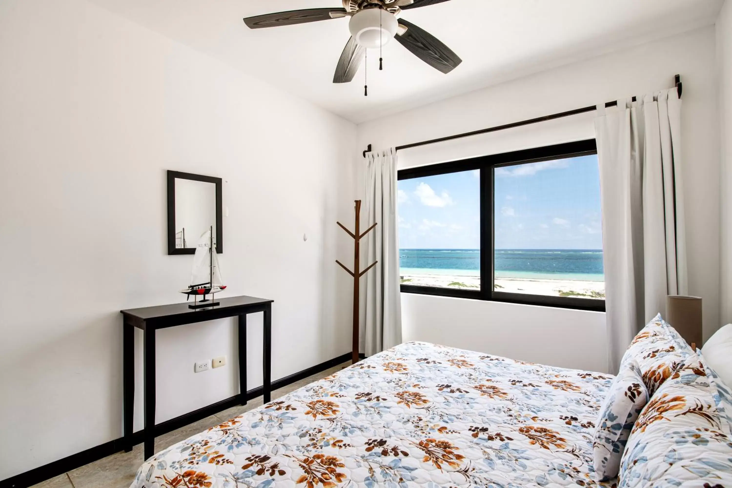 Bed in Vela's Condos Ocean Front