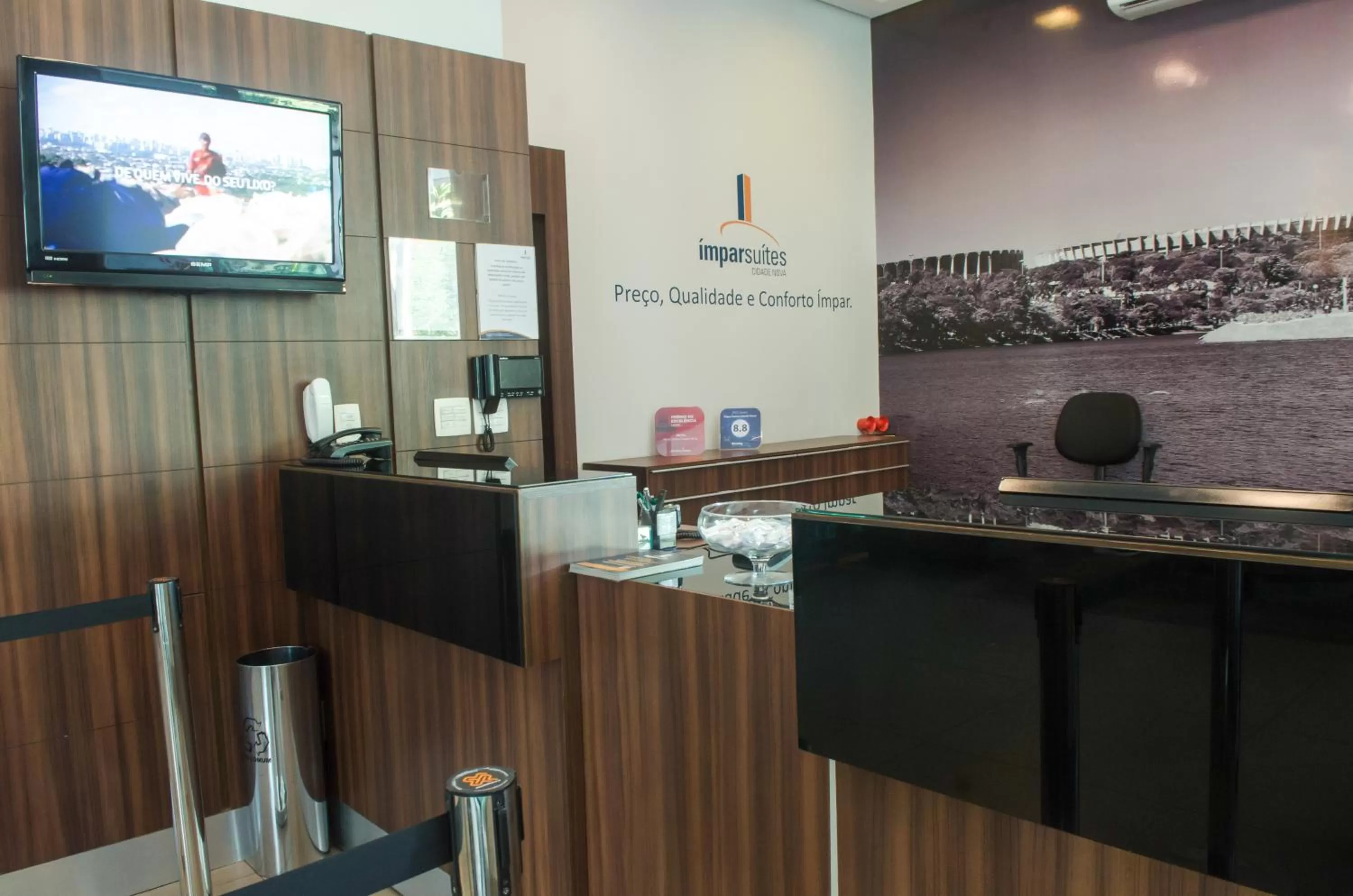 Lobby or reception, TV/Entertainment Center in Ímpar Suítes Cidade Nova