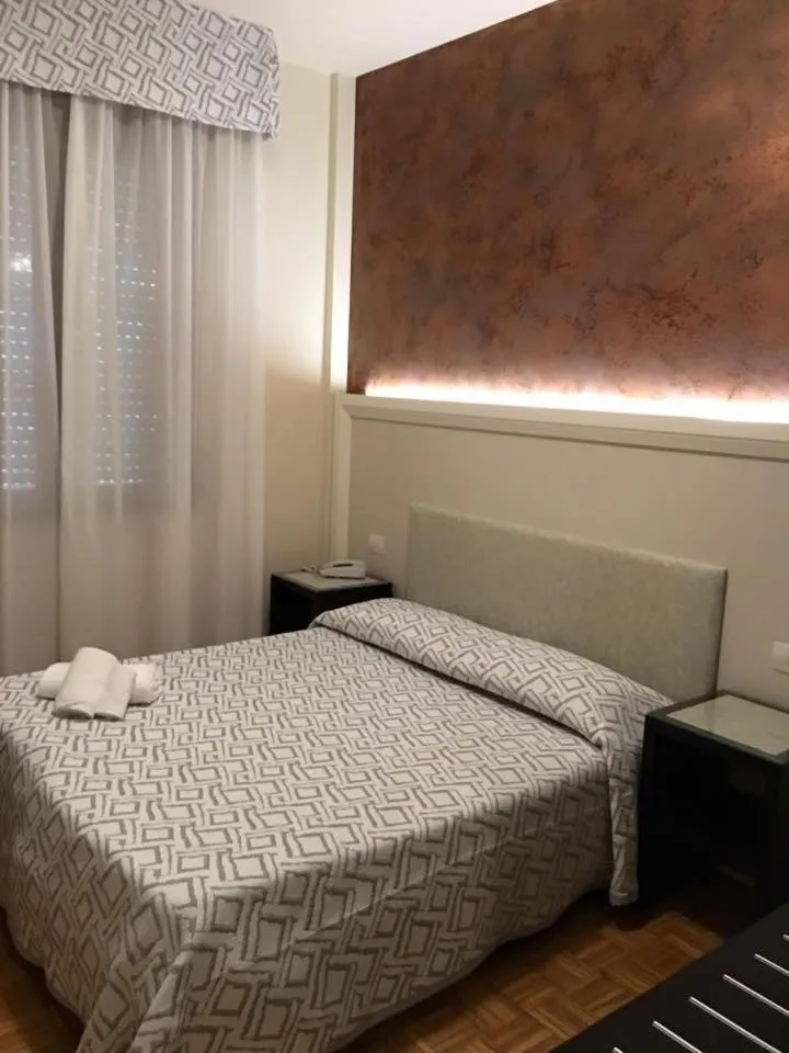 Bed in Hotel Astoria