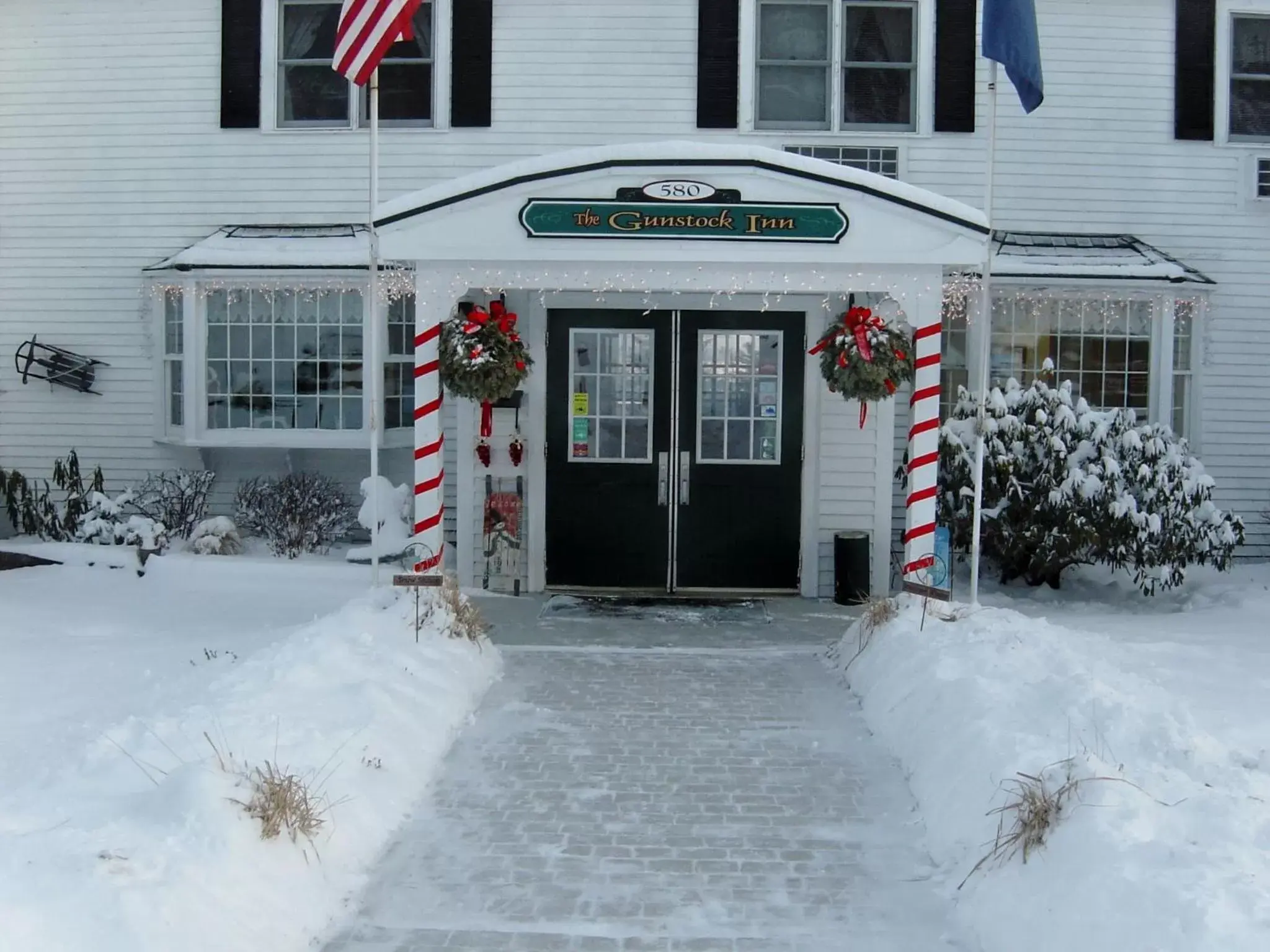 Facade/entrance, Winter in Gunstock Inn & Suites