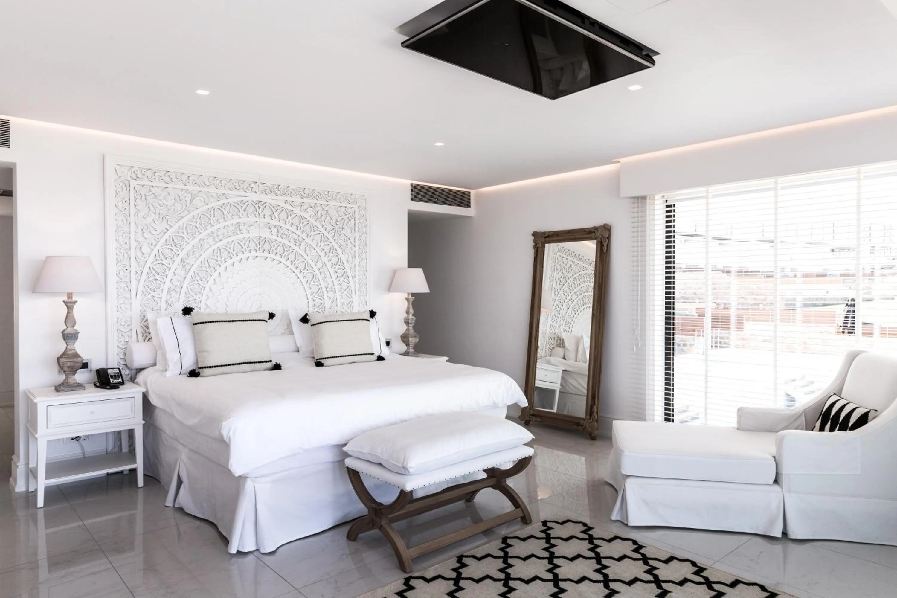 Bed in Abaton Island Resort & Spa