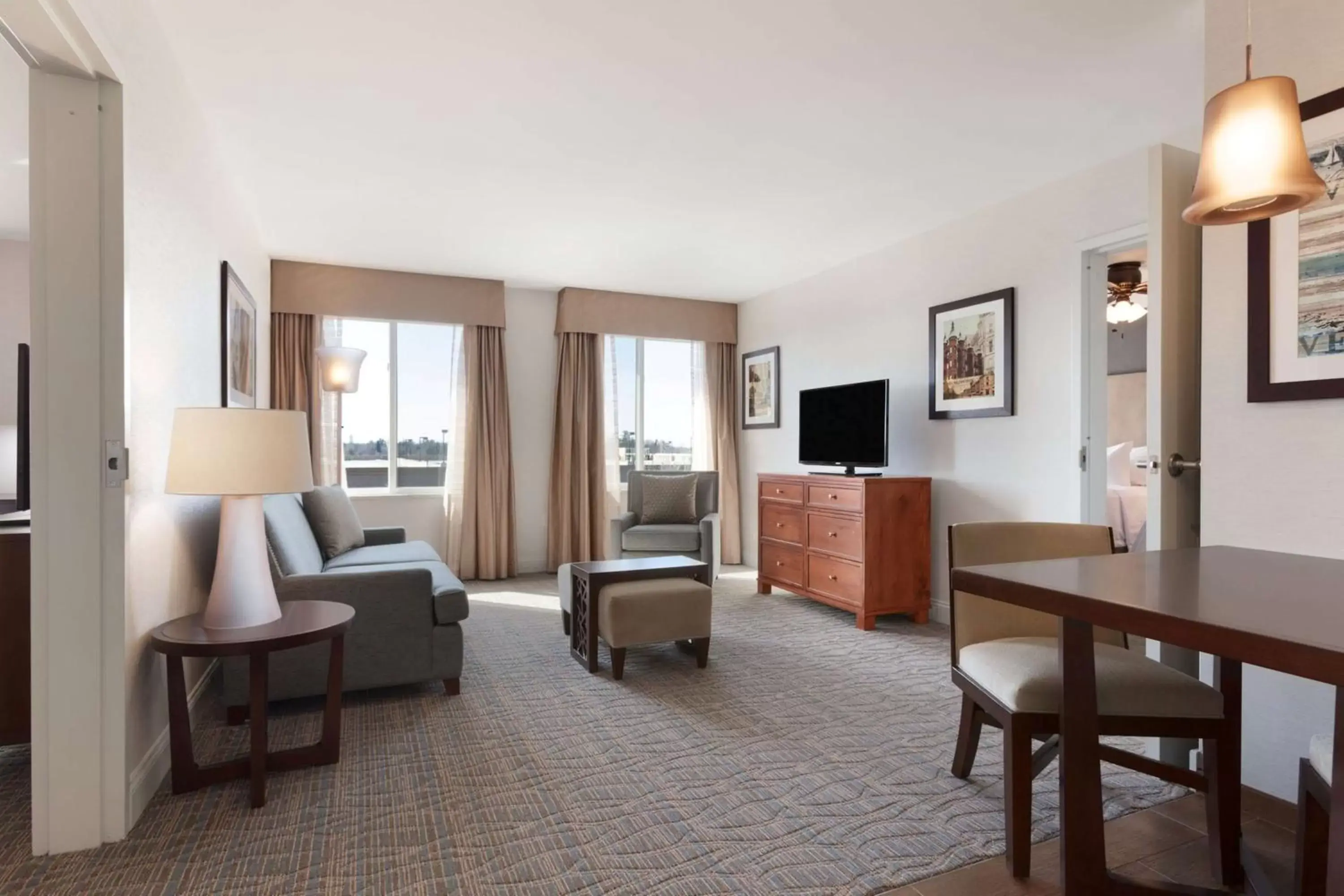 Living room, Seating Area in Homewood Suites by Hilton Burlington